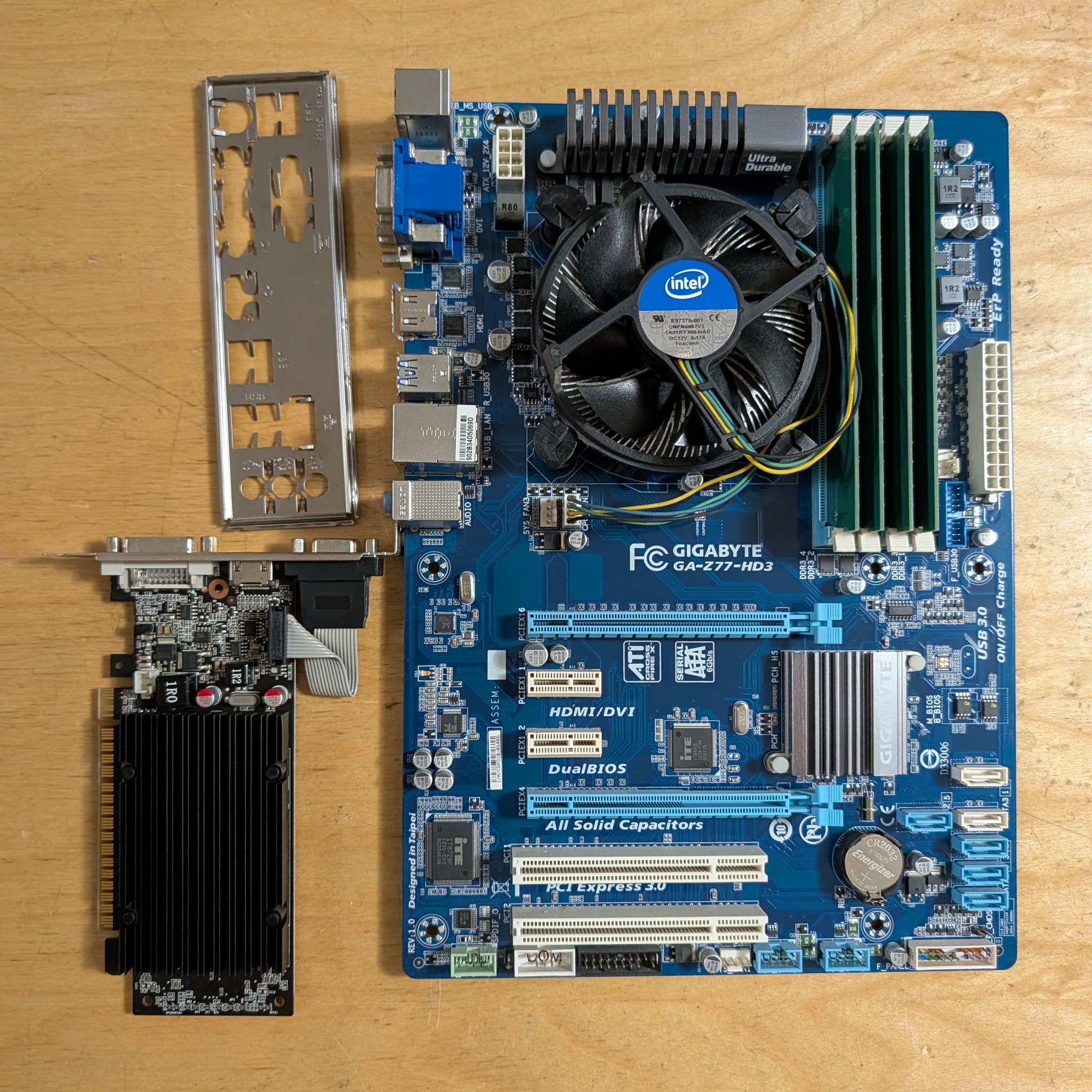 Core i7 3770 + Z77 motherboard + 16GB DDR3 + Nvidia GT210 1GB