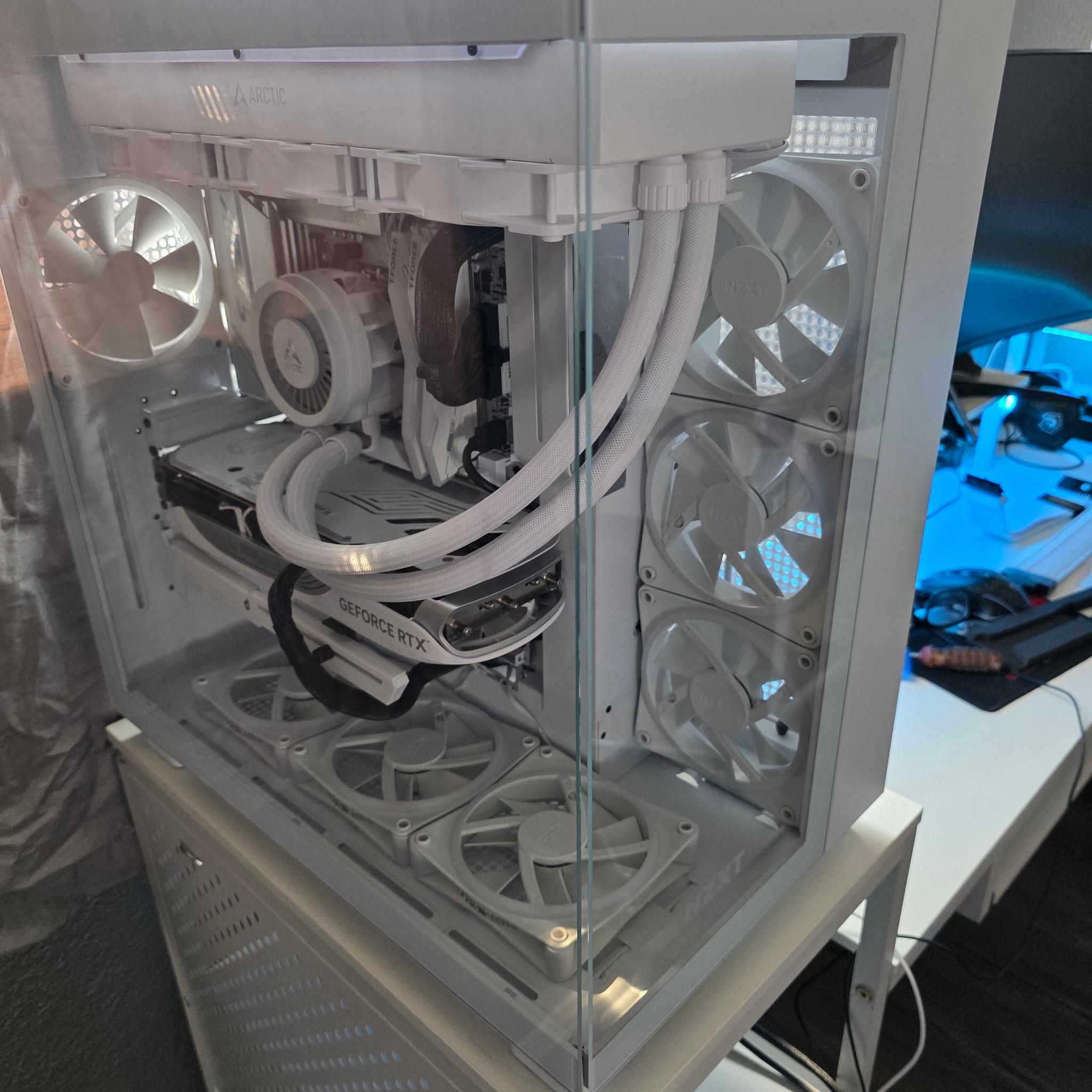 Nzxt white h9 flow/elite mesh and glass top panel included . Ryzen 7 9800xd, 4080 super, aorus x870e