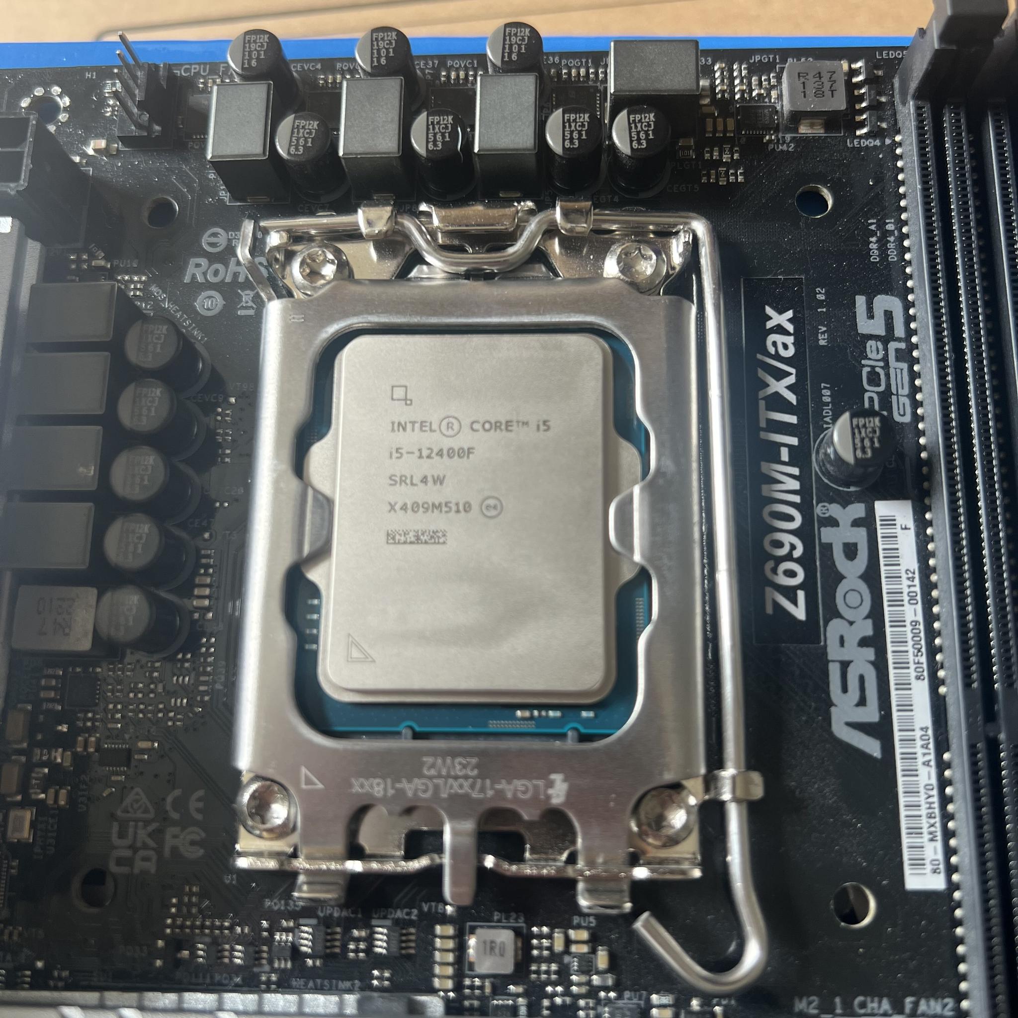 Asrock Z690m-itx/ax DDR4 wifi motherboard and i5 12400f combo (DDR4)