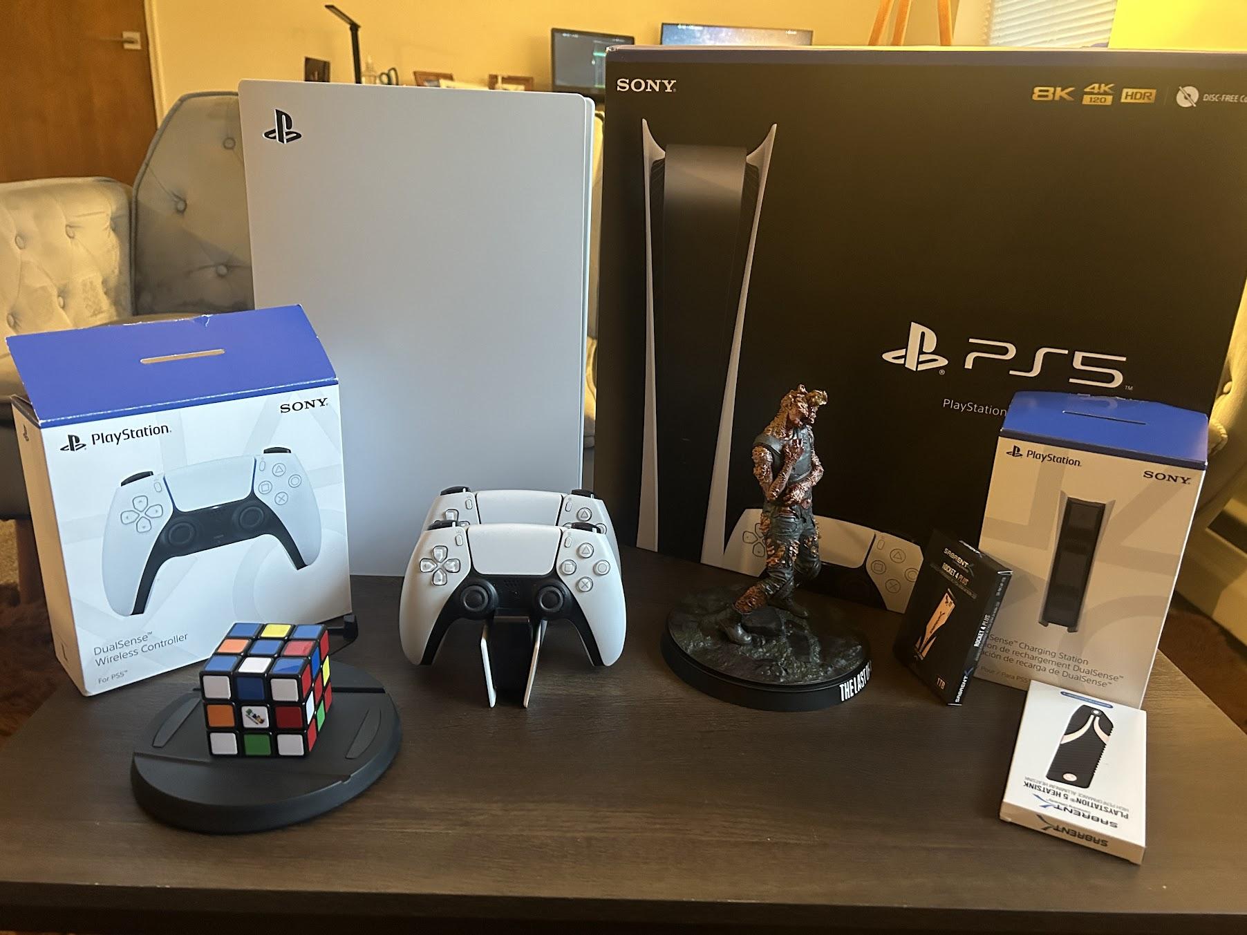 PS5 Digital Edition + Sabrent 1TB Rocket Plus 4 SSD Extra Storage + 2 Controllers + Charging station
