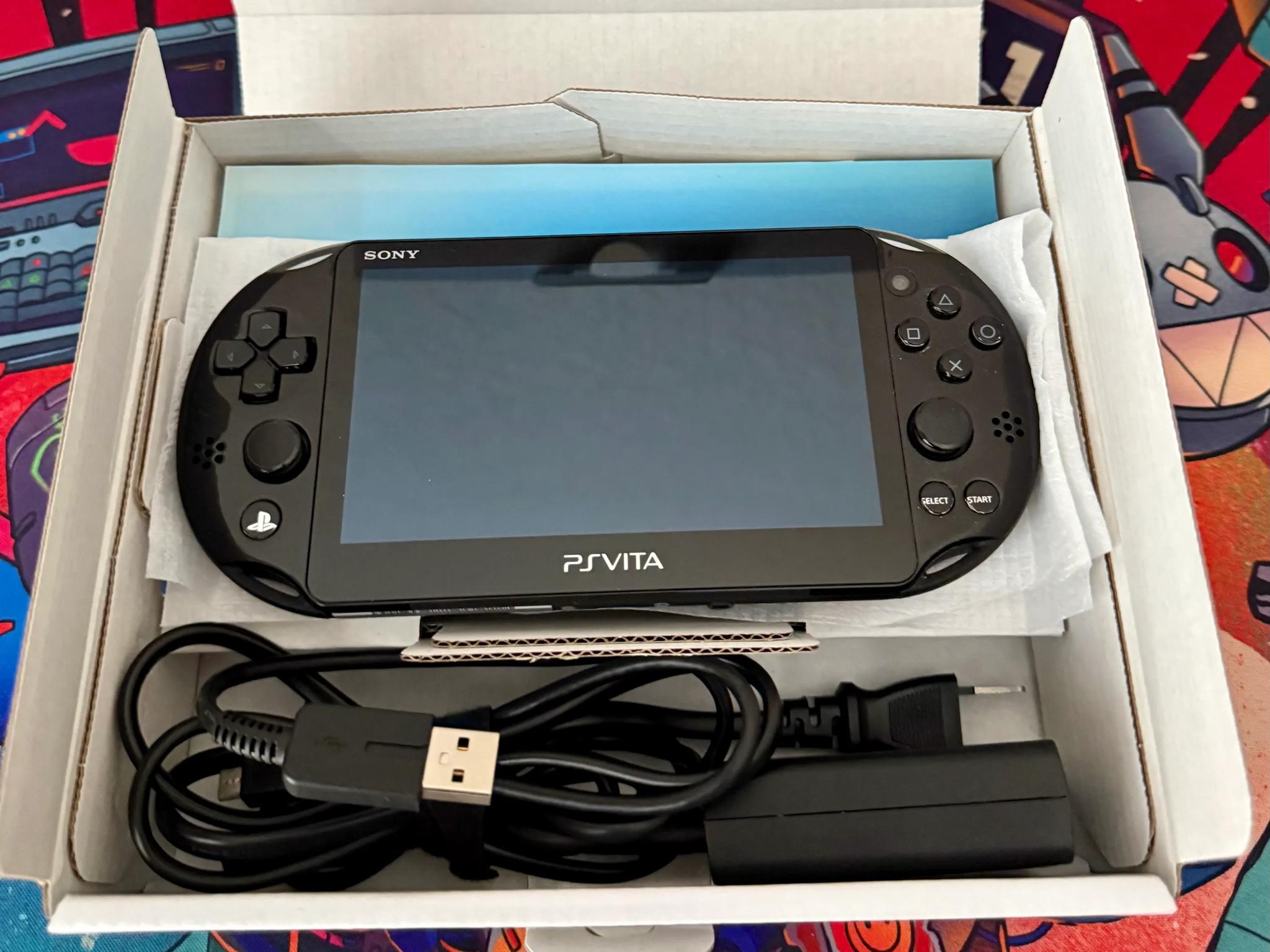 Near Mint | PSVita Console + 5 PSVita Games | PCH-2000