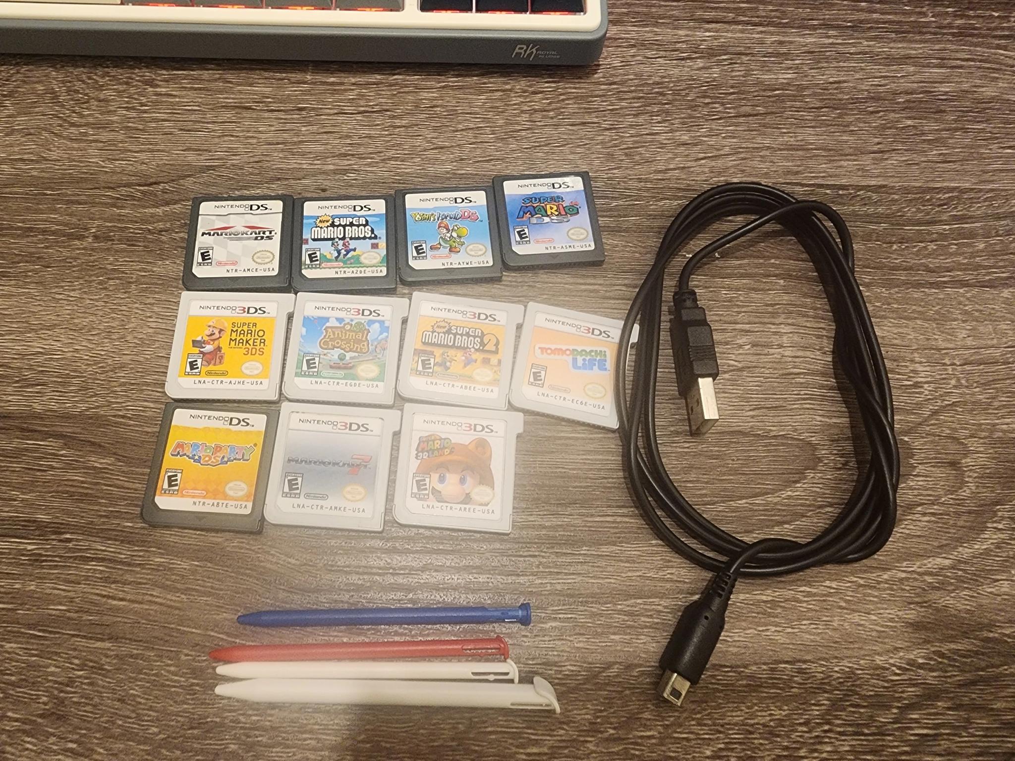 New Nintendo 3DS (Non-XL), Games, Case, 2 chargers, and clear case on console, 32gb microSD