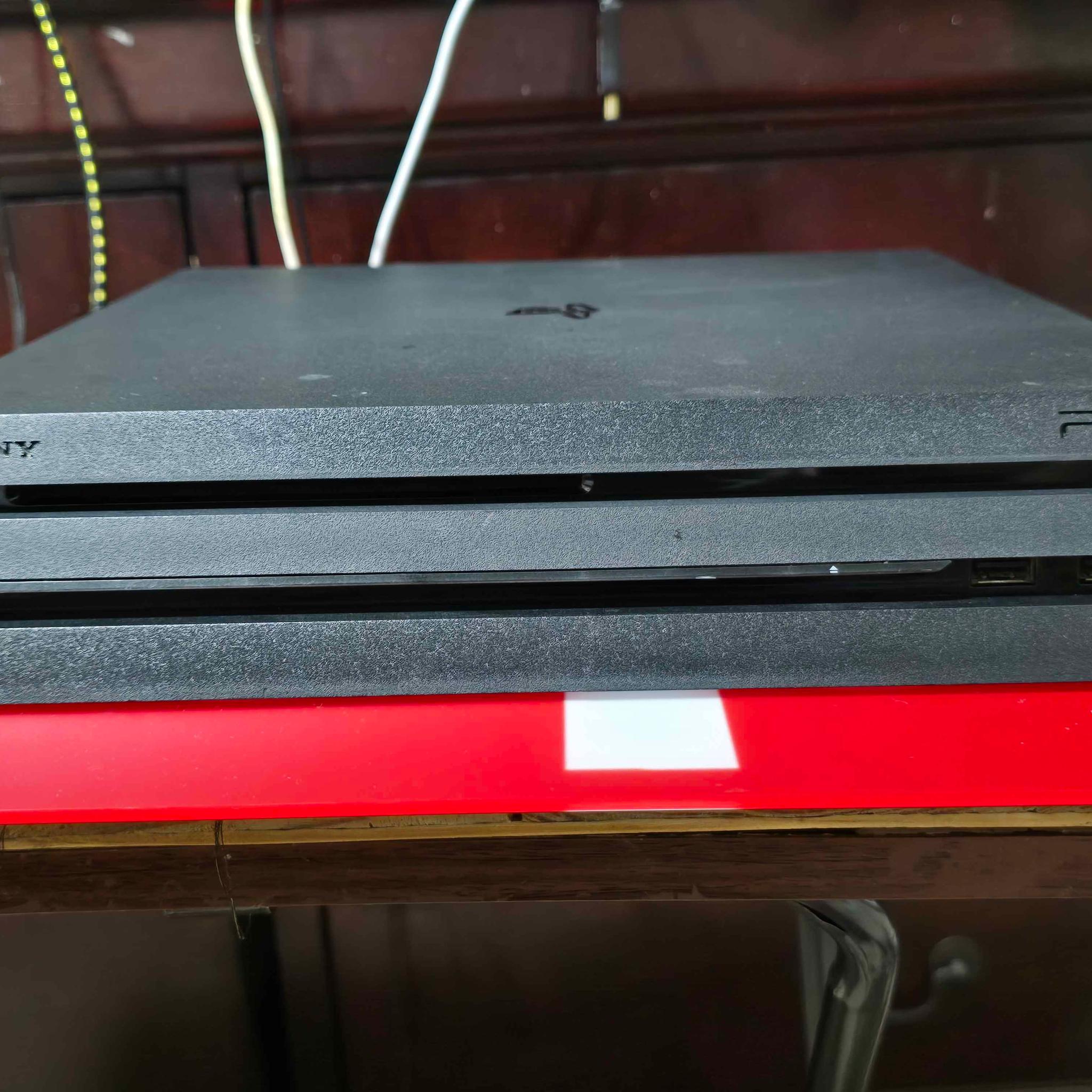 Sony PlayStation 4 Pro 1TB Console Black (incl. AC Adapter + Controller w/ Charger)