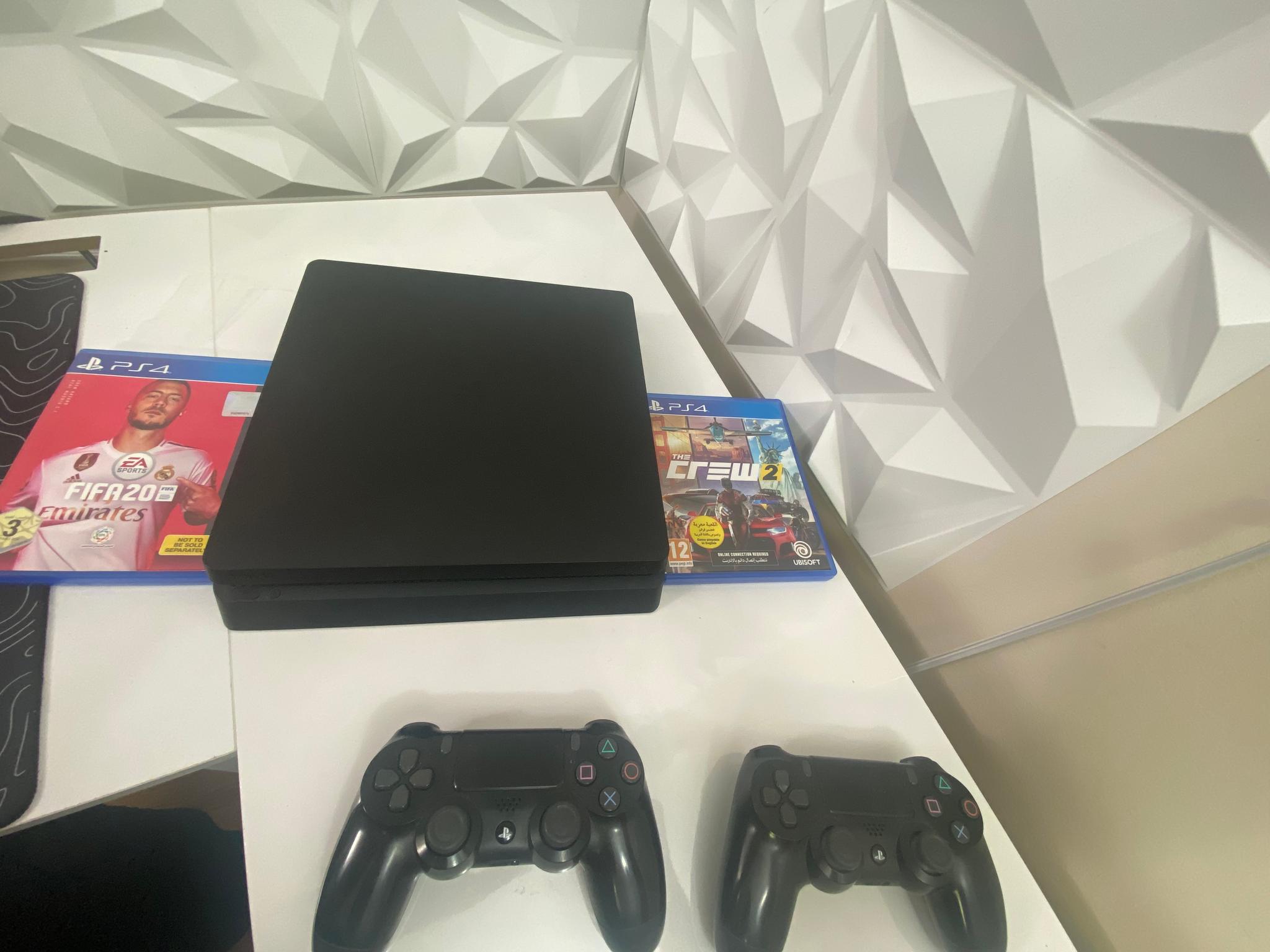 PS4 Slim 1TB with 2 Controllers and 2 Free Games ( Fifa 20 + The Crew 2 ) Good Condition