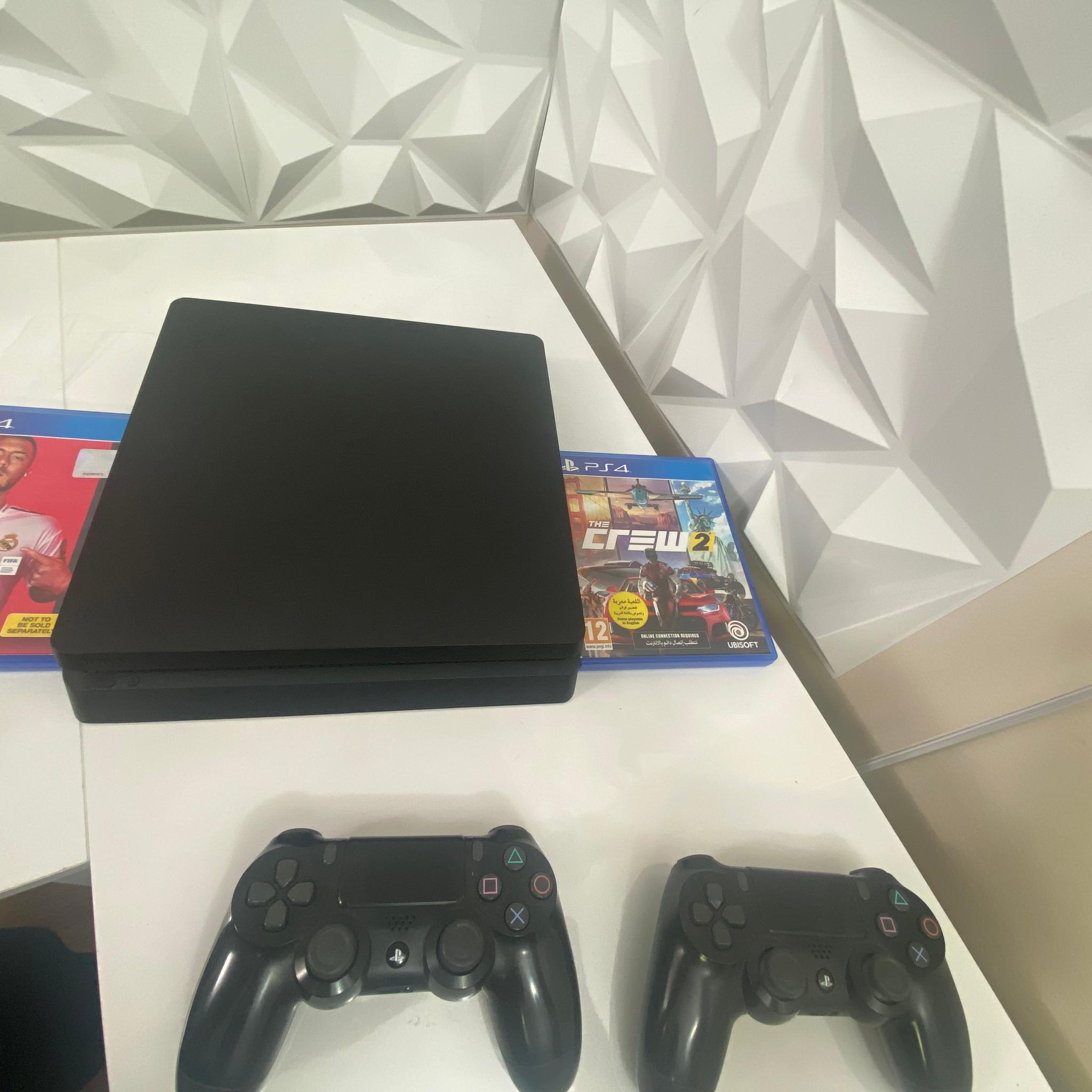 PS4 Slim 1TB with 2 Controllers and 2 Free Games ( Fifa 20 + The Crew 2 ) Good Condition