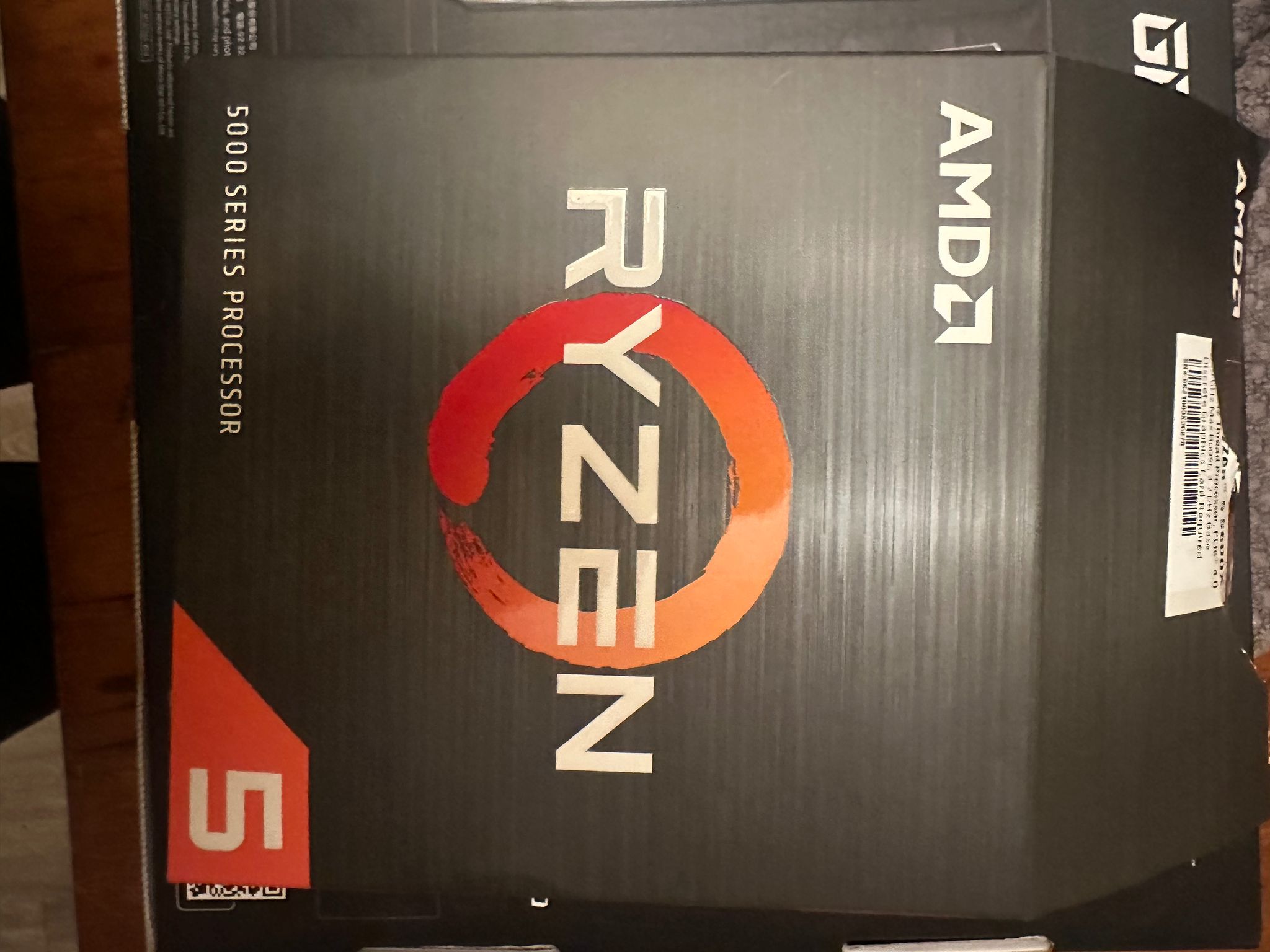 AMD Ryzen5 5600 X and stock cooler with box.
