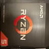 AMD Ryzen5 5600 X and stock cooler with box.