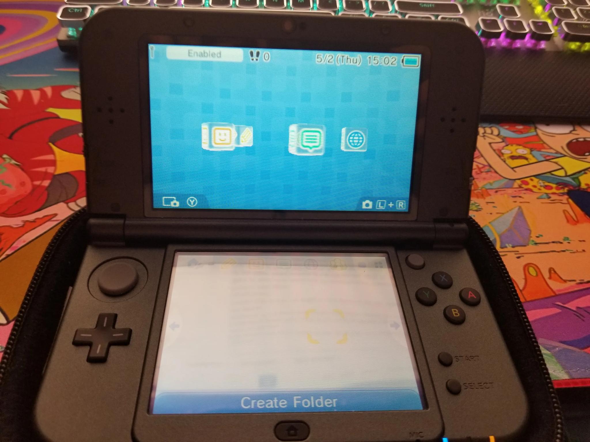 Fully Modded Nintendo New 3DS XL 4GB Handheld Gaming System W carrying case and 200 games installed.