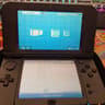 Fully Modded Nintendo New 3DS XL 4GB Handheld Gaming System W carrying case and 200 games installed.