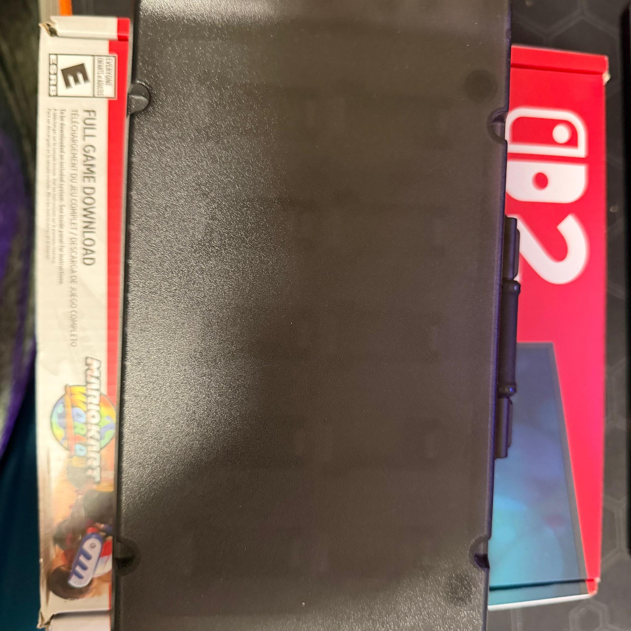 Nintendo switch 2 console with dBrand case and Donkey Kong Bonanza game