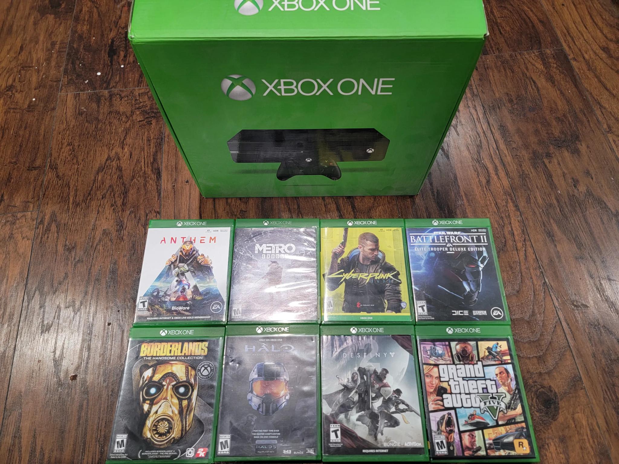 Xbox one with elite series 1 controller and 8 games