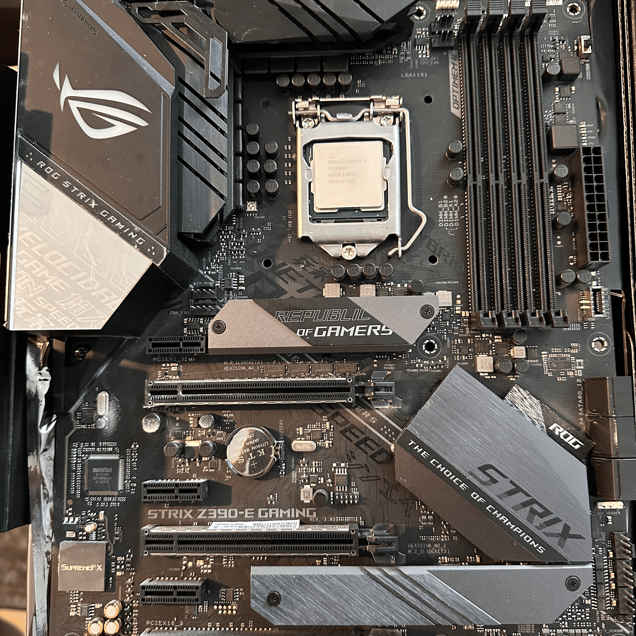 ASUS ROG STRIX Z390-e gaming motherboard with intel i9-9900k cpu installed