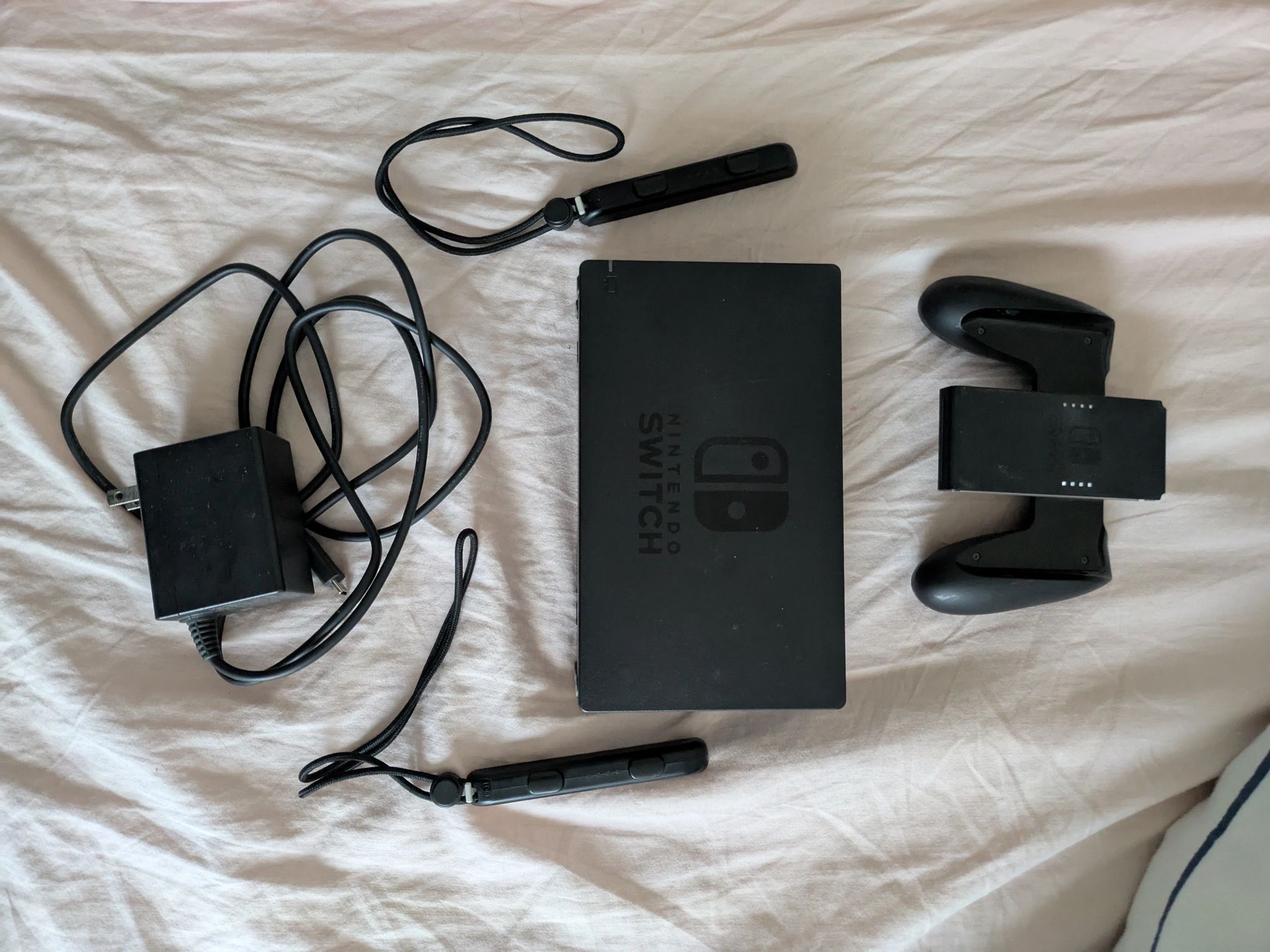 Nintendo Switch with Dock, Charger and controller base with 128GB SD card