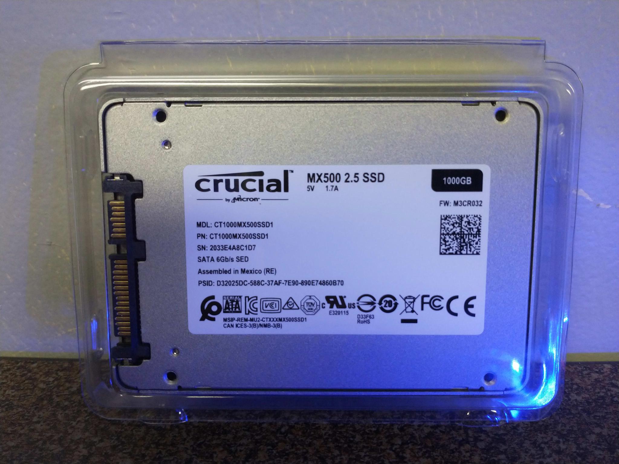 Brand-new 1TB Crucial MX500 with 9.5mm shim in OEM packaging