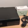 Dell Optiplex with visible damage, refurbished as a cheap steam box running bazzite
