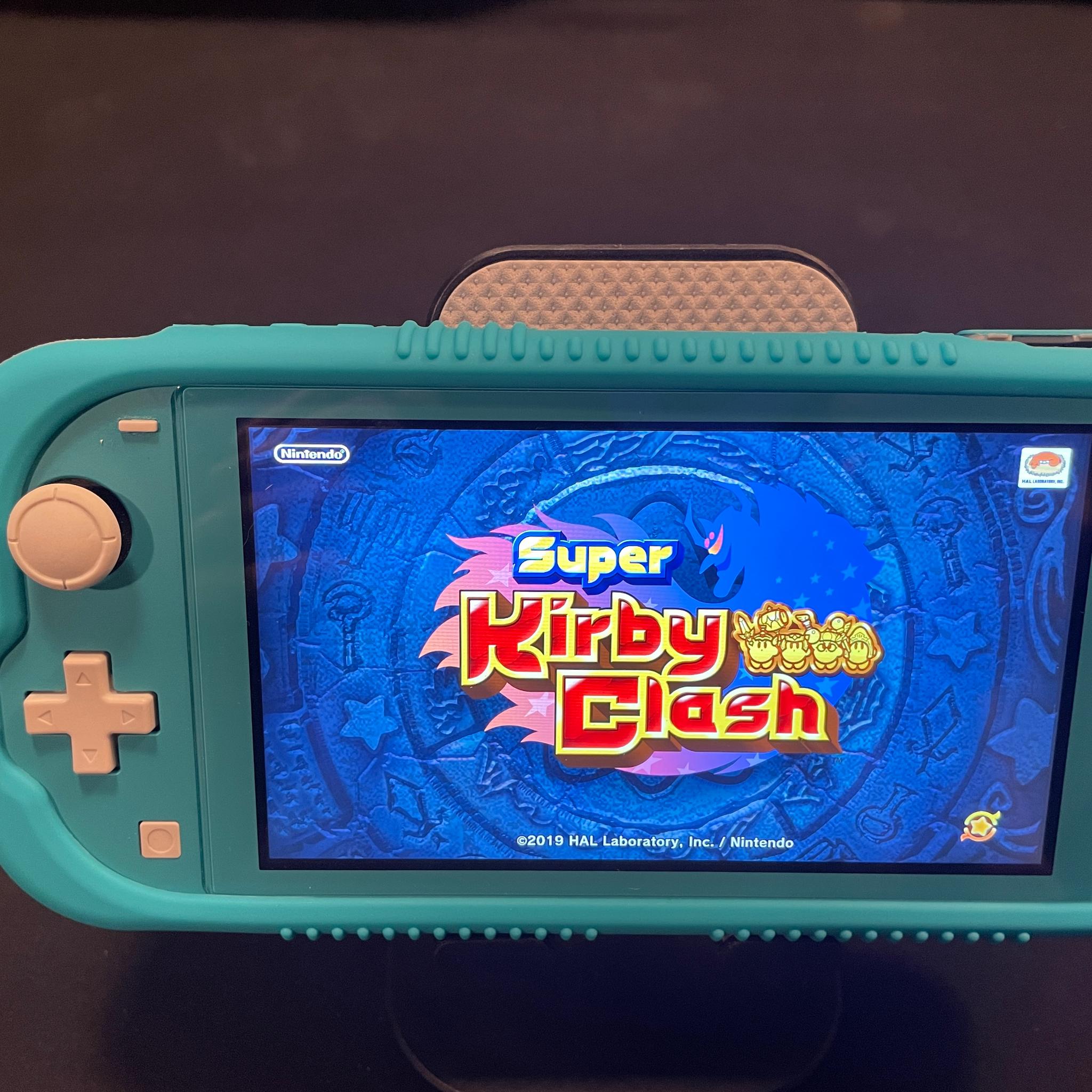 Nintendo Switch Lite Blue With Grip Case And Accessories