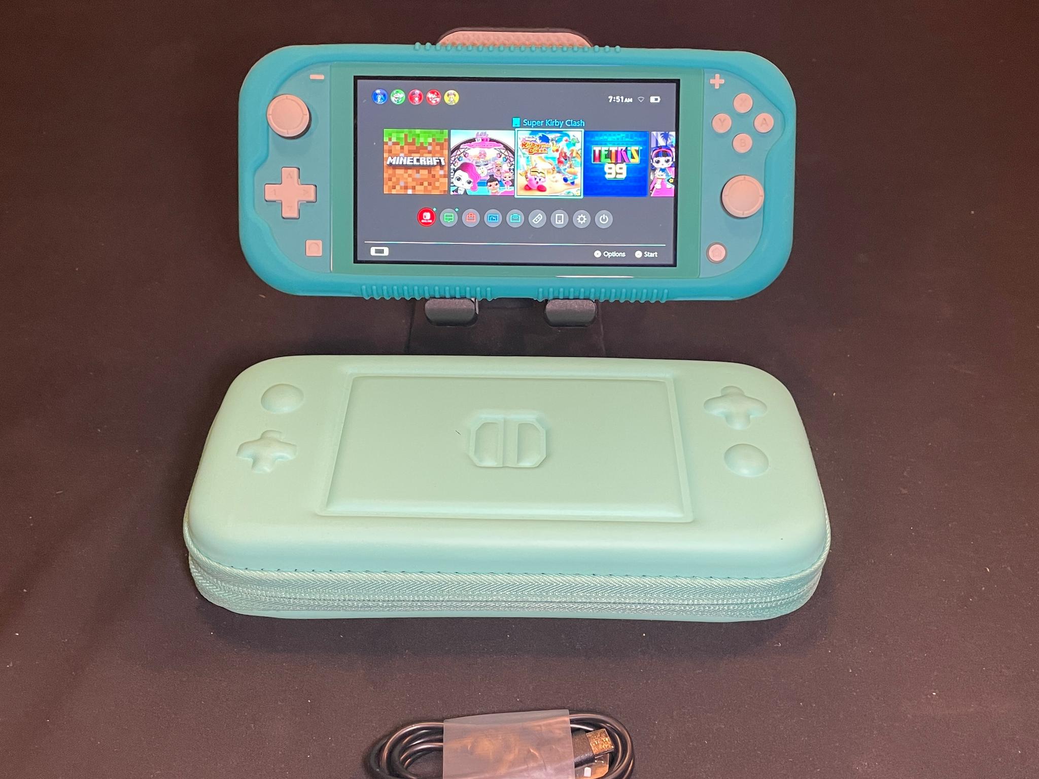 Nintendo Switch Lite Blue With Grip Case And Accessories