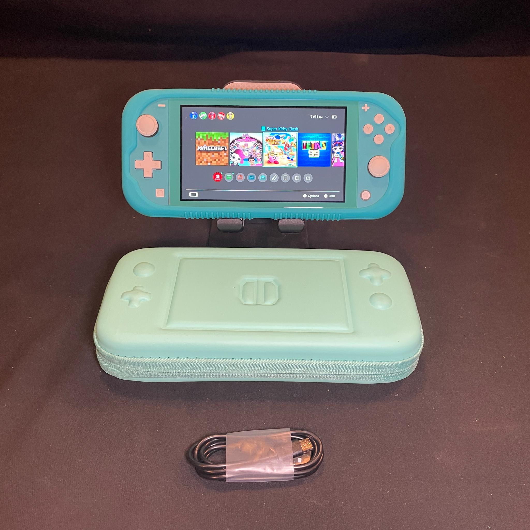 Nintendo Switch Lite Blue With Grip Case And Accessories