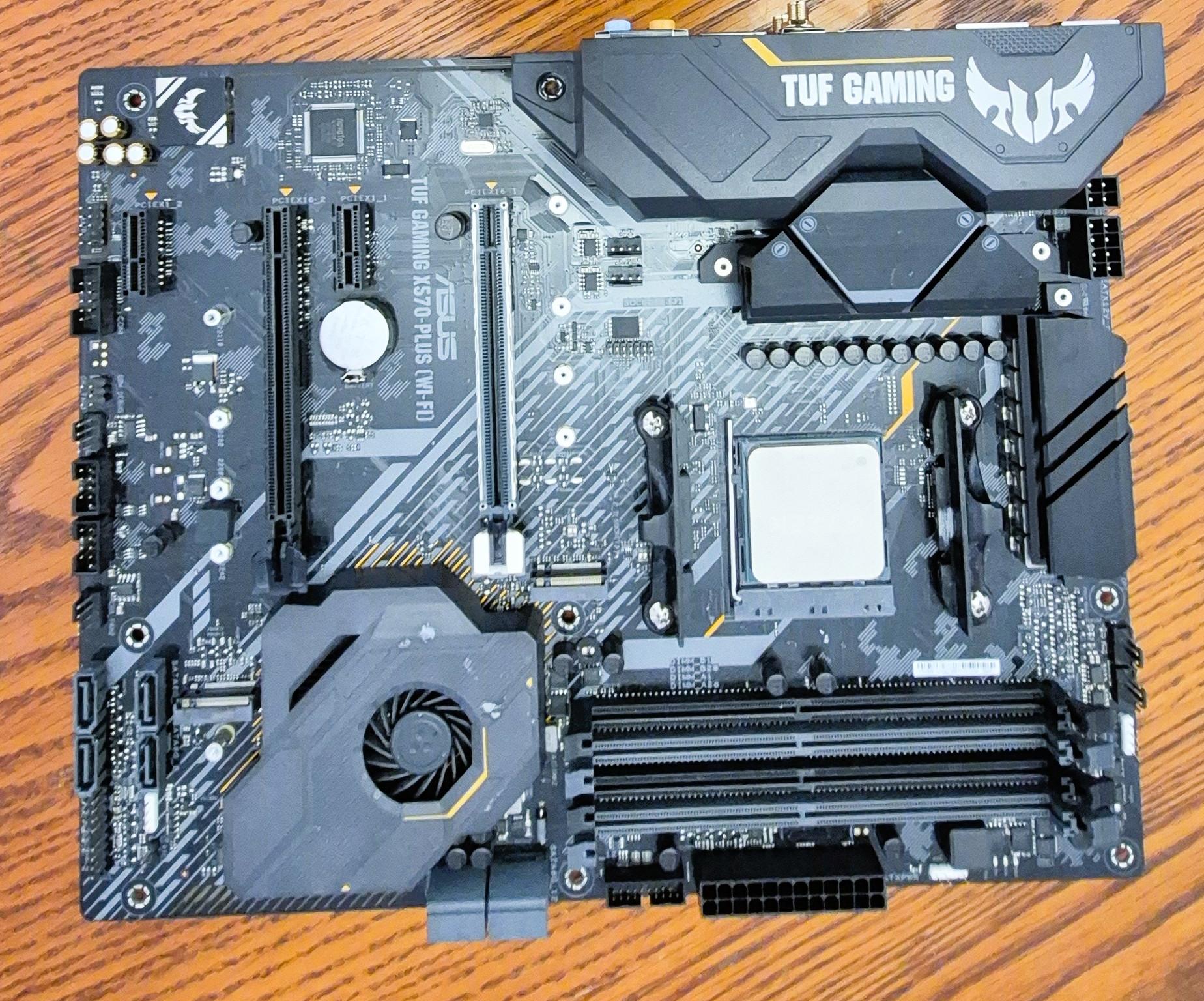 Pre-owned AMD Ryzen 9 5950X CPU, ASUS TUF Gaming X570 Plus (WI-FI) AXT M-board  and AMD Wrath Cooler