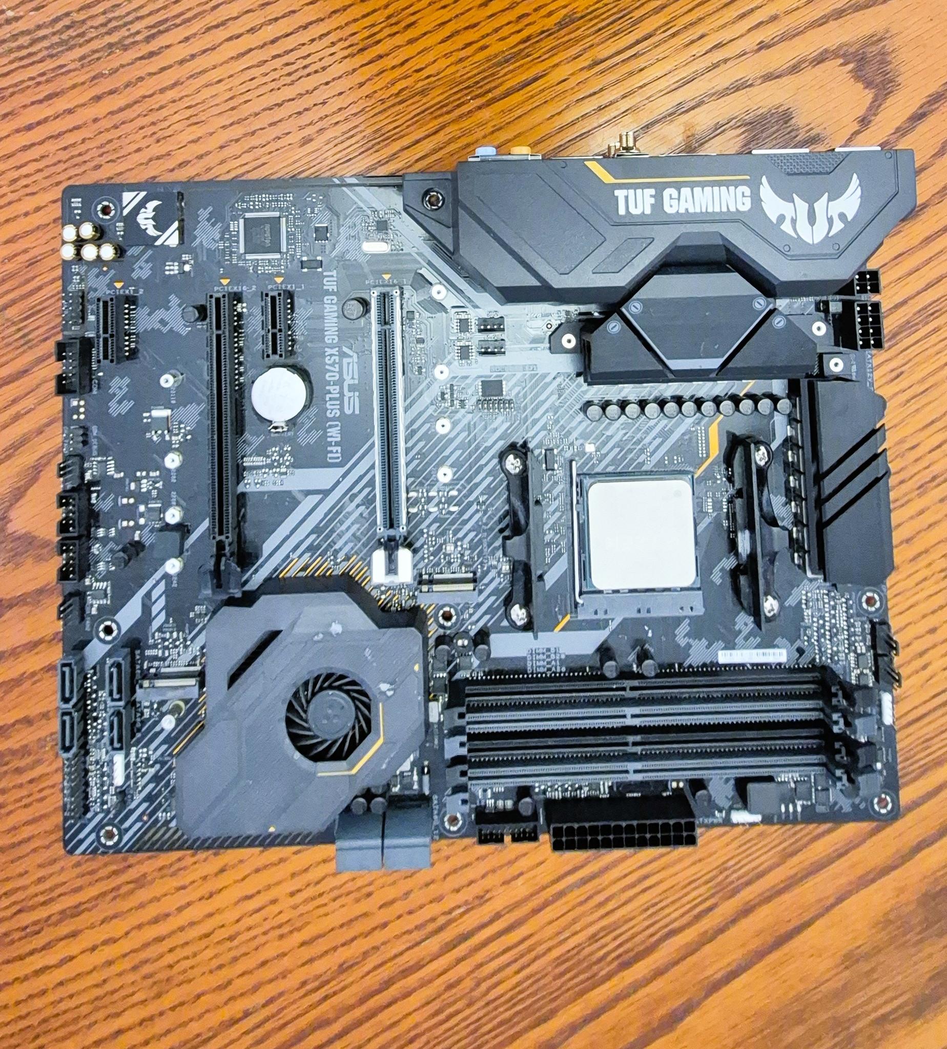 Pre-owned AMD Ryzen 9 5950X CPU, ASUS TUF Gaming X570 Plus (WI-FI) AXT M-board  and AMD Wrath Cooler