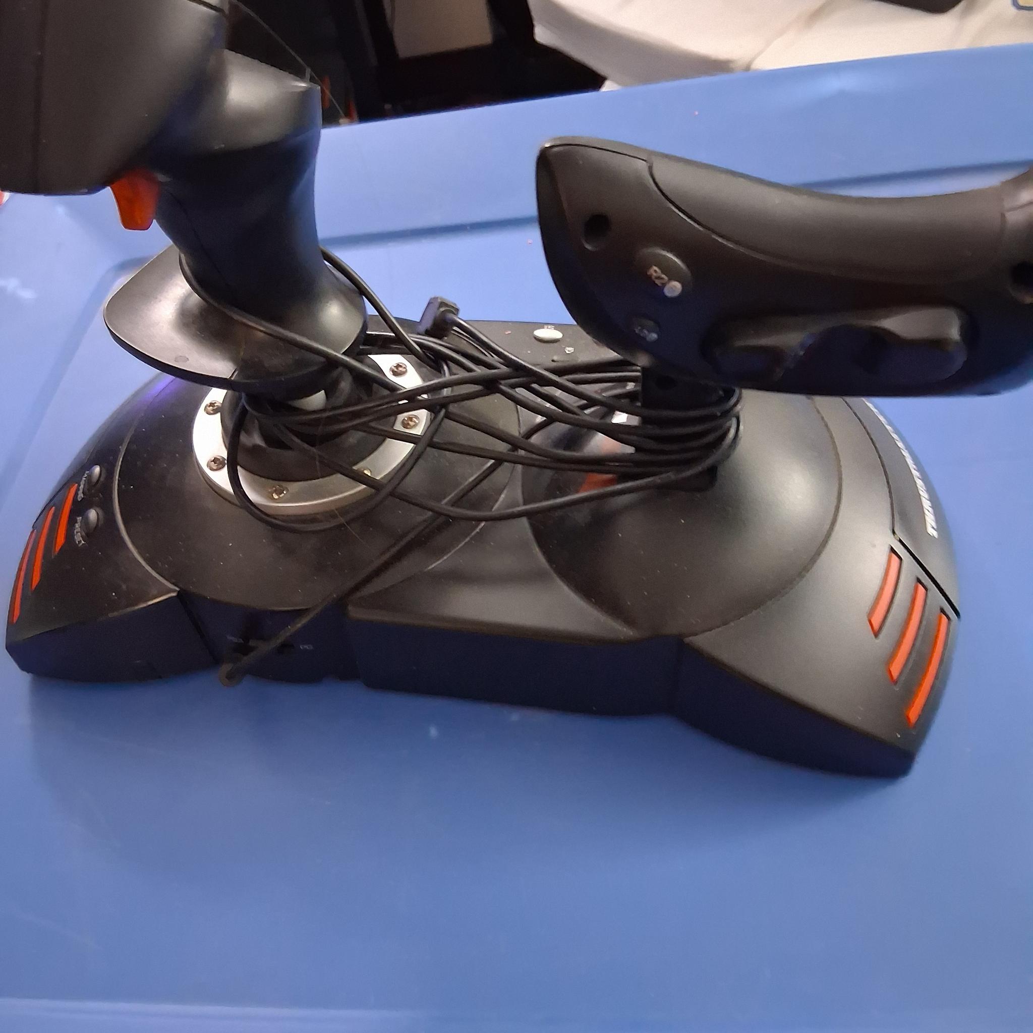 Thrustmaster T-Flight Hotas X — one-piece flight control system with twisty stick and throttle!