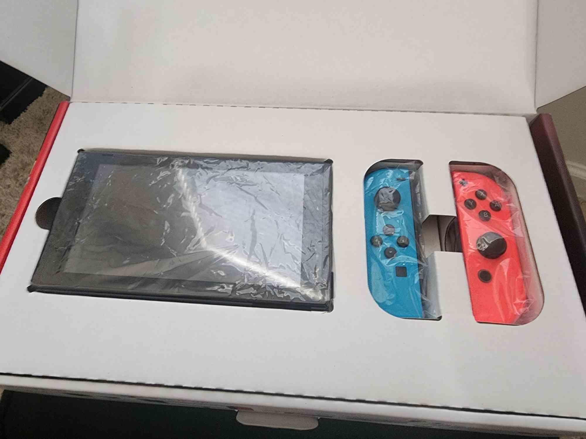 Nintendo Switch Bundle – w/ Box, 200GB SD Card, 3 Games, Case (Bundle)