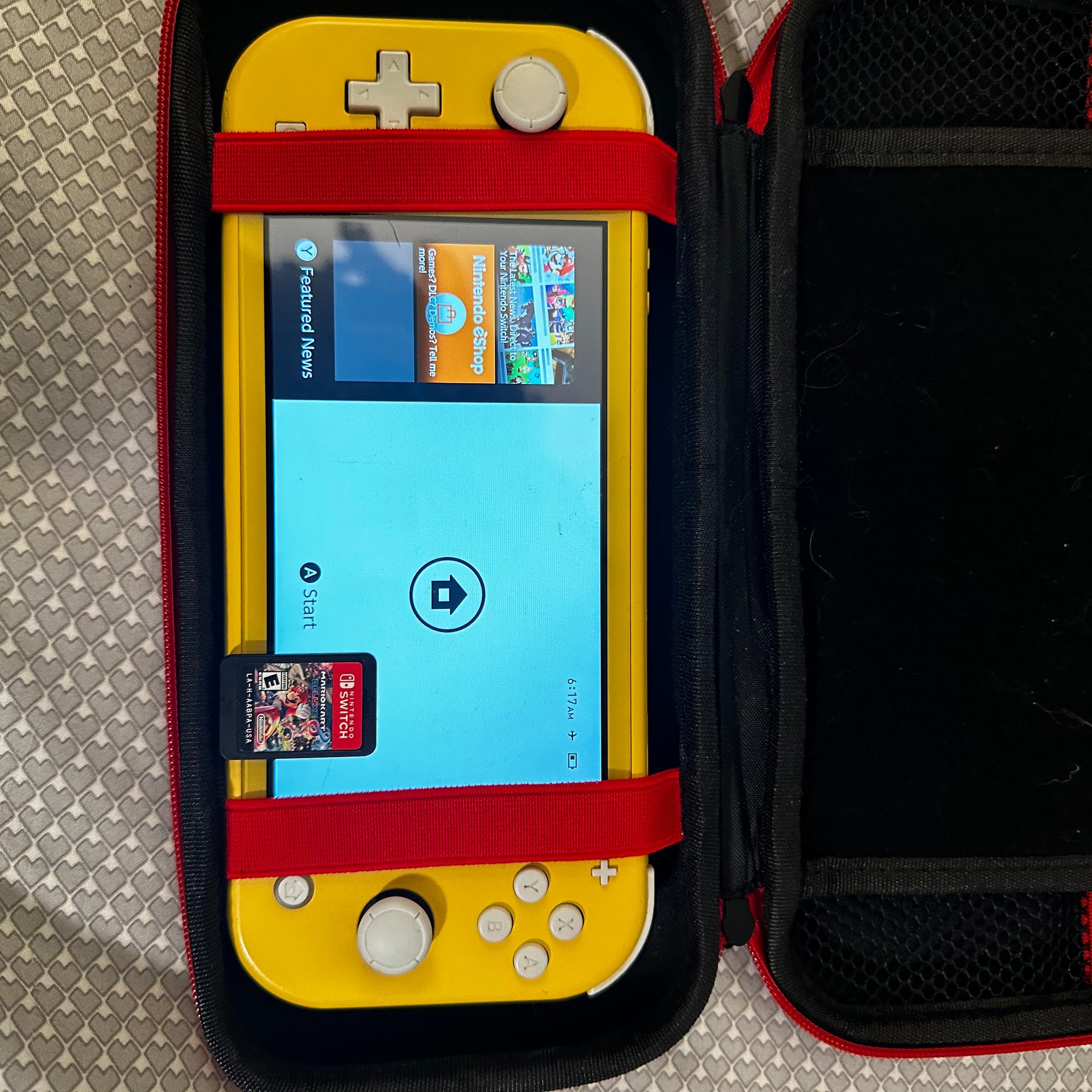 Nintendo Switch Lite w/ Mario kart 8 deluxe/Carry case