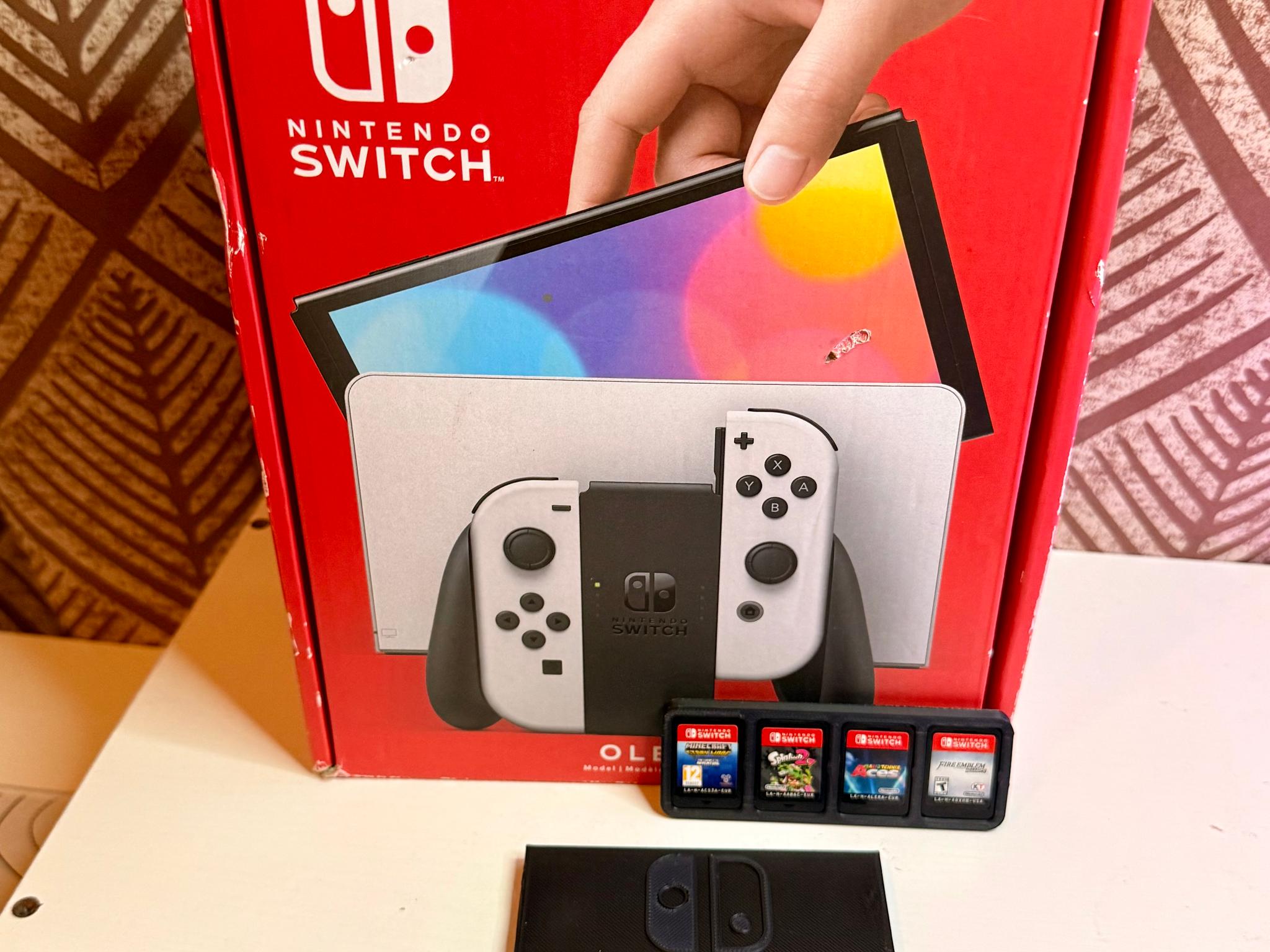 Nintendo Switch OLED White + 4 Free Games