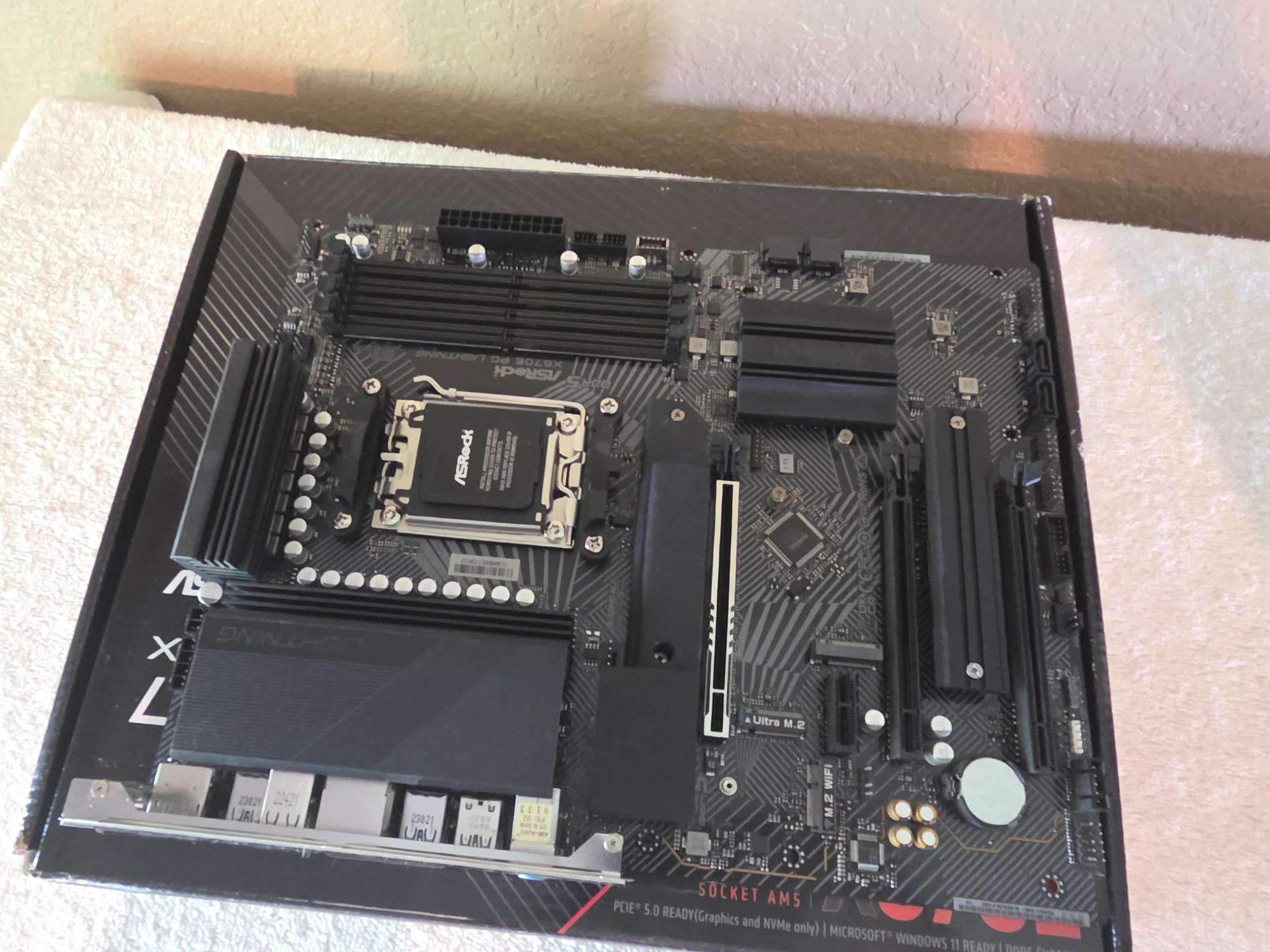 Used ASRock X670E PG Lightning motherboard with New AMD Ryzen 5 9600X