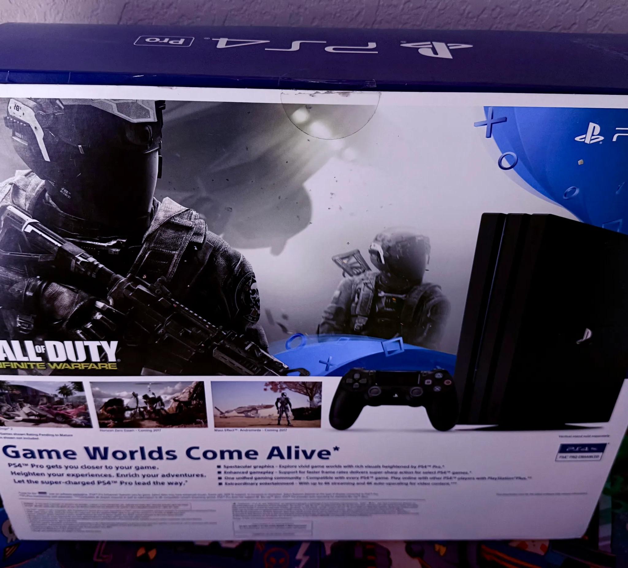 Sony PlayStation 4 Pro 1TB Console (Black) + 7 Games