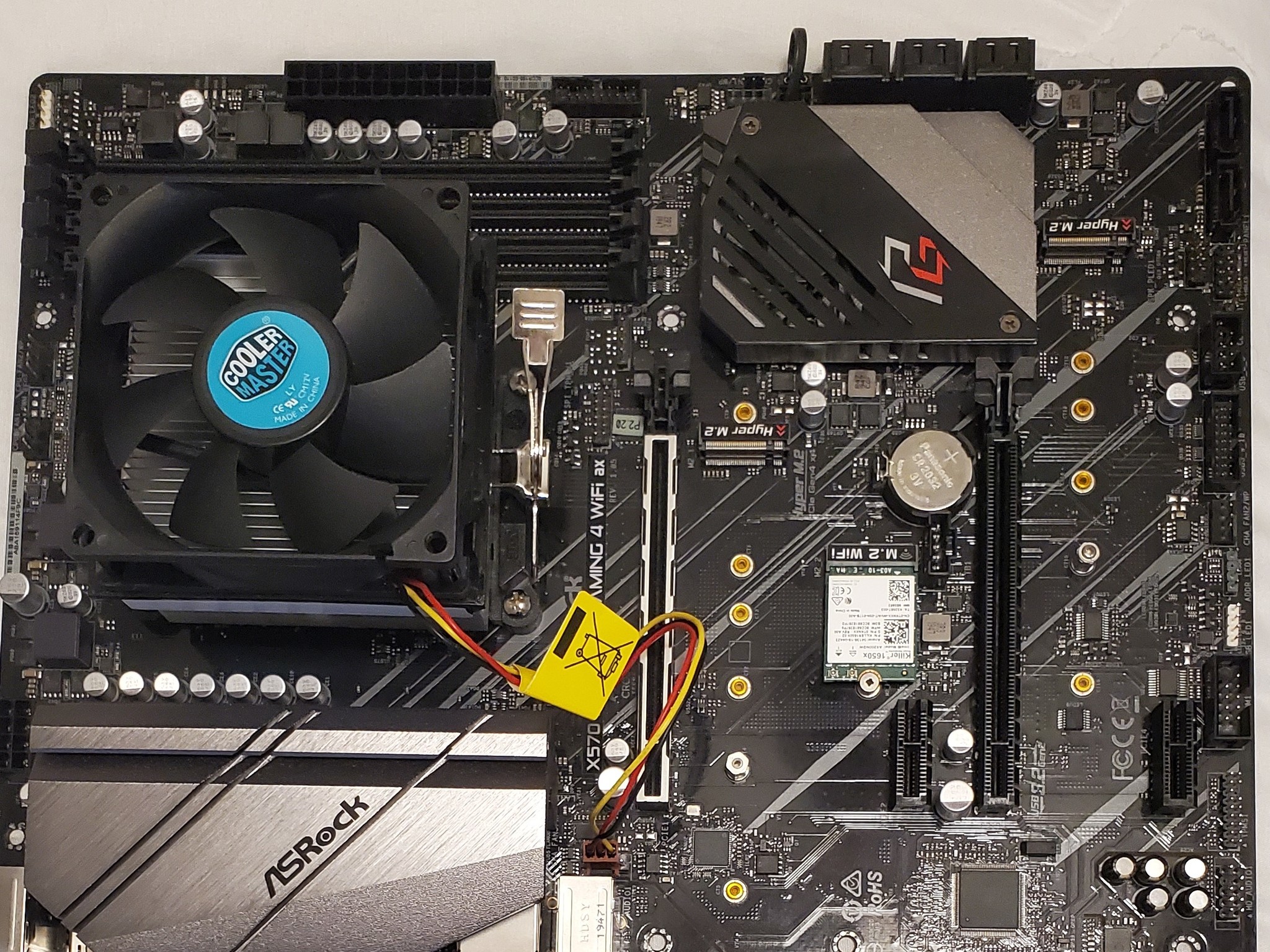 Pre-owned Combo AMD Ryzen 9 5900X CPU, ASRock X570 PHANTOM GAMING 4 WIFI AX MOTHERBOARD and Cooler