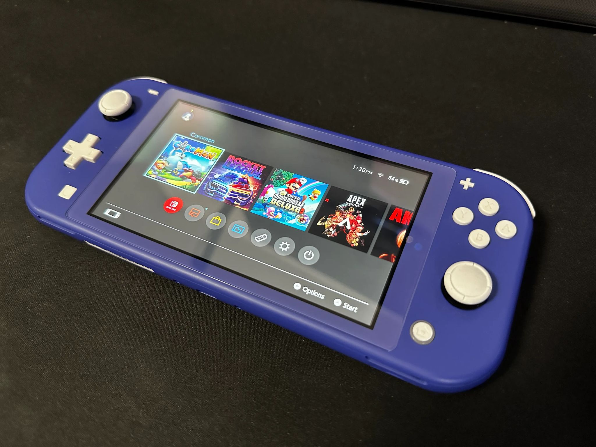 Nintendo Switch Lite 32GB (Blue) BUNDLE (Case + 5 Games Included)