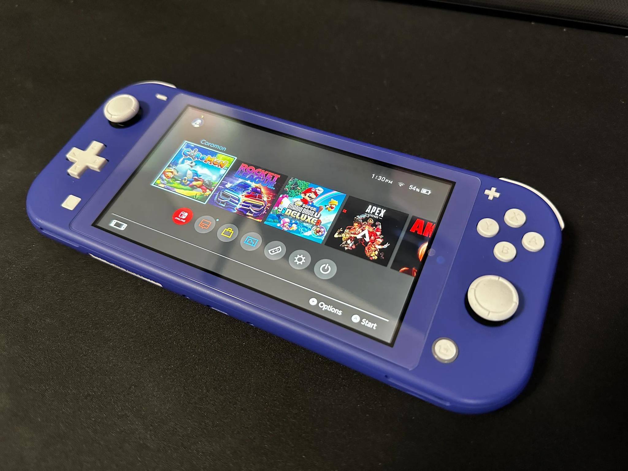 Nintendo Switch Lite 32GB (Blue) BUNDLE (Case + 5 Games Included)