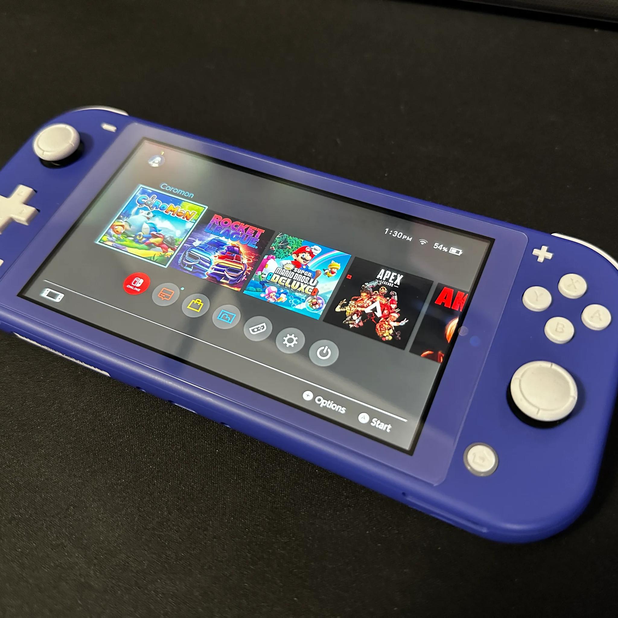 Nintendo Switch Lite 32GB (Blue) BUNDLE (Case + 5 Games Included)