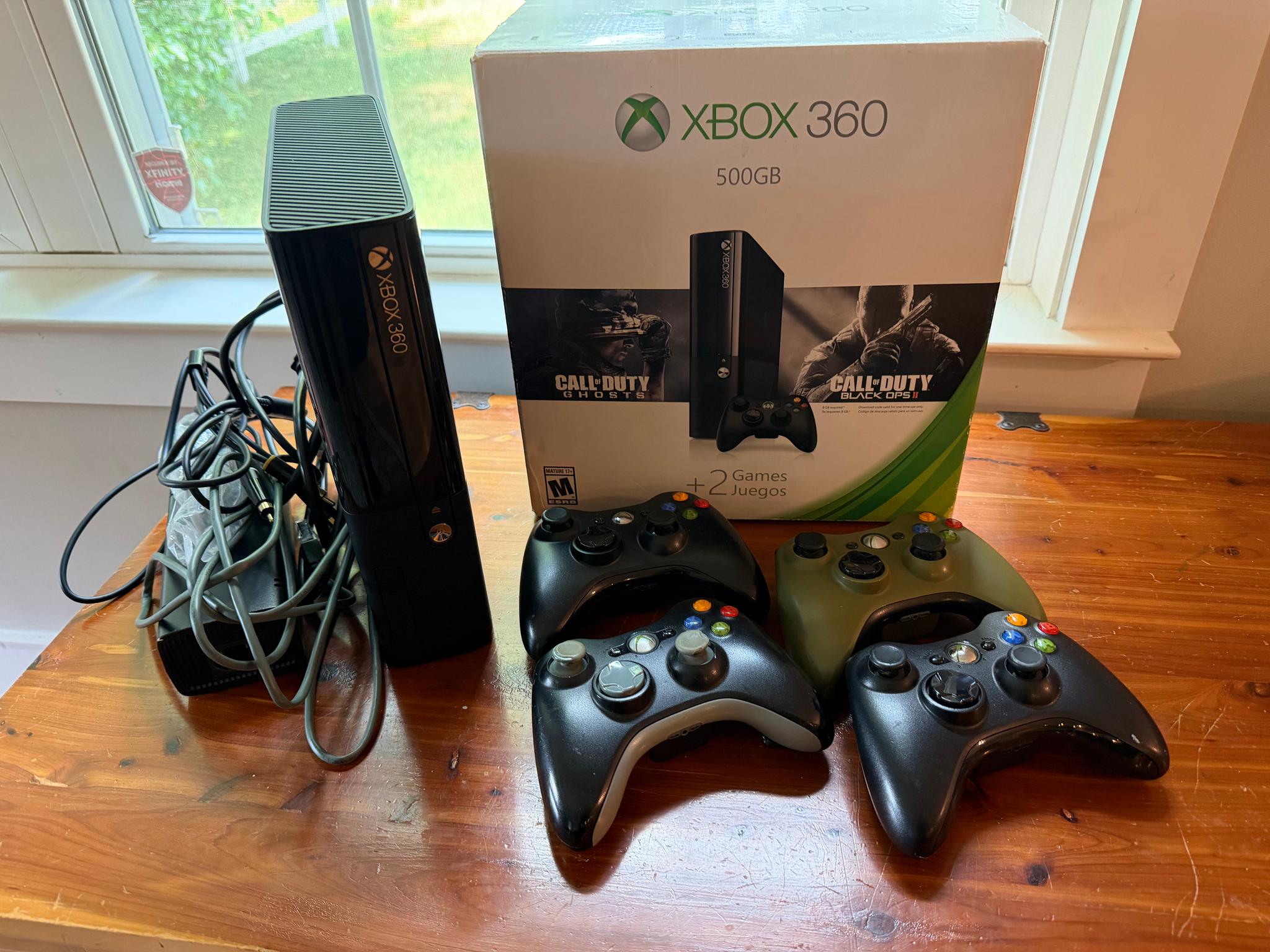 Xbox 360 E model w/ Games