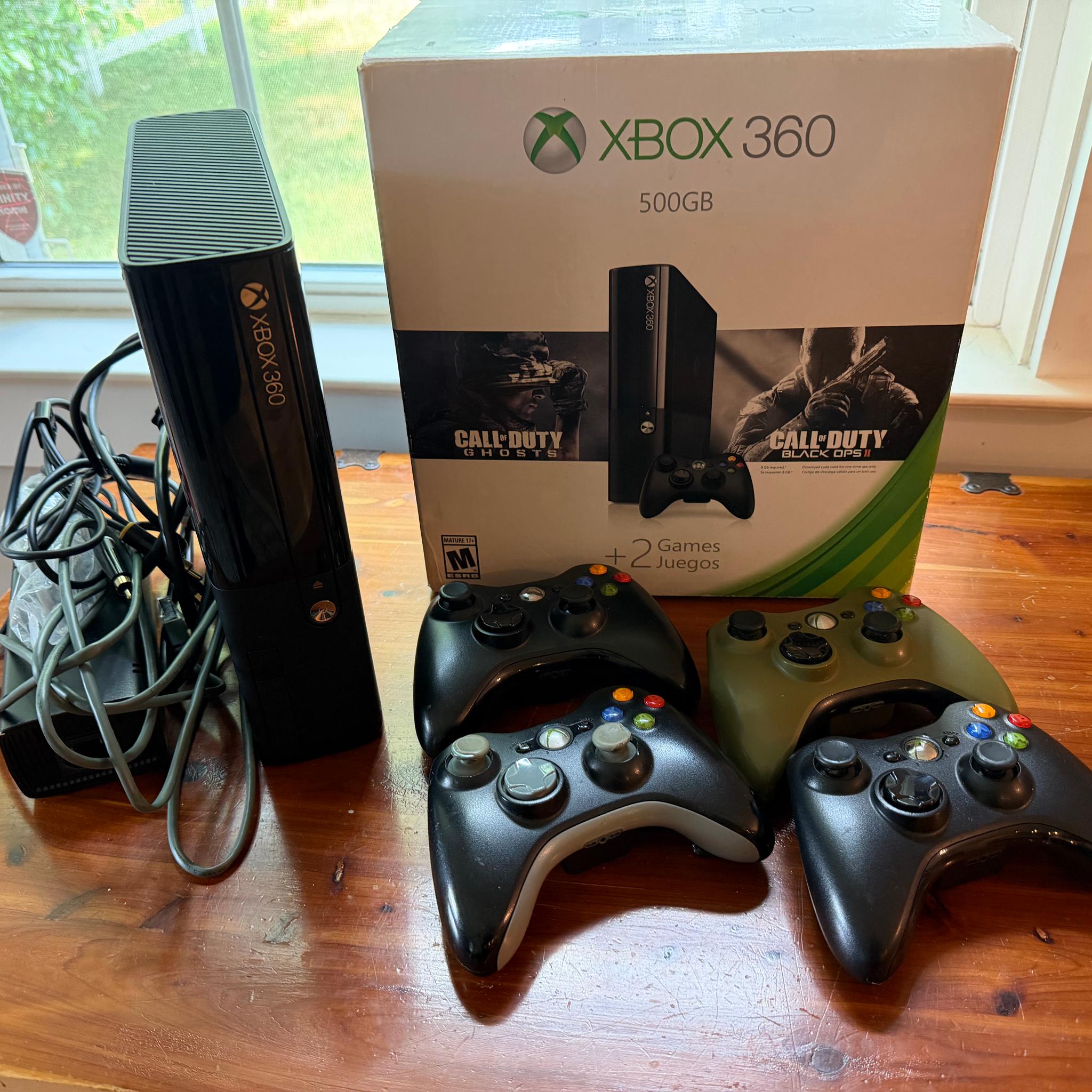 Xbox 360 E model w/ Games