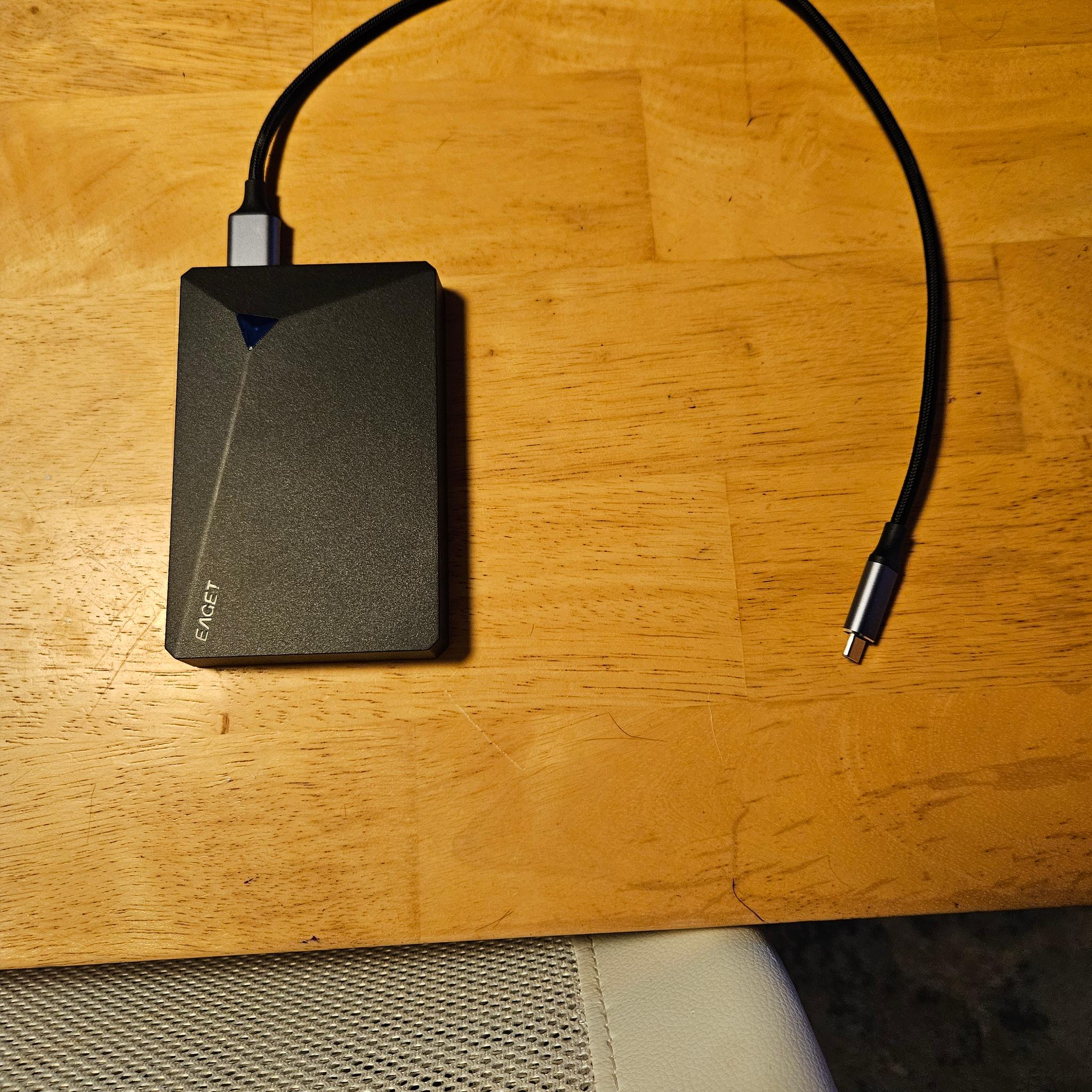 Eaget 1TB Backup HDD with 2 512 HDD's stacked in an Enclosure