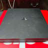 Sony PlayStation 4 Pro 1TB Console Black (incl. AC Adapter + Controller w/ Charger)