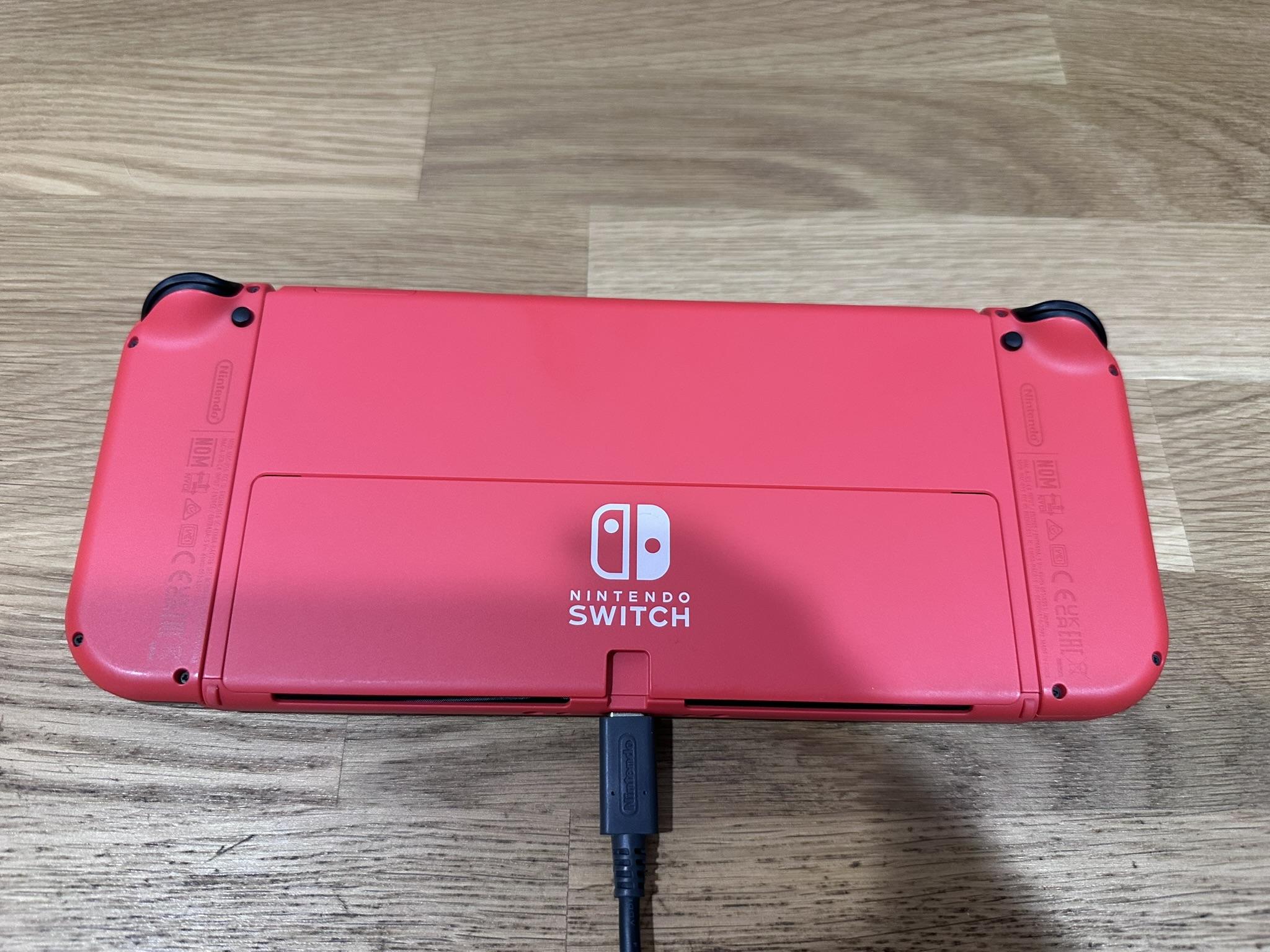 Nintendo Switch OLED with travel case
