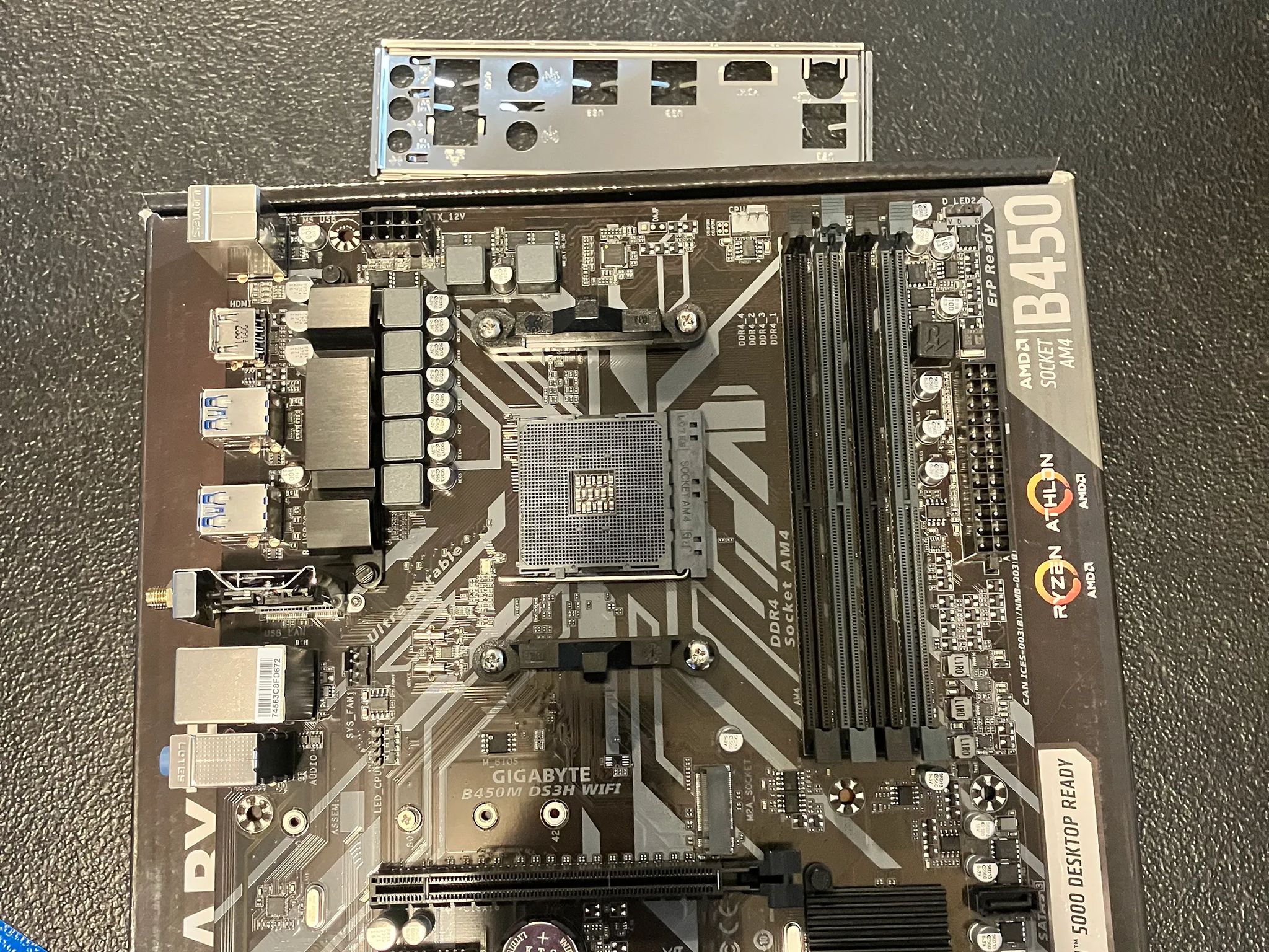 Open Box: Gigabyte B450M DS3H Wi-Fi Micro ATX AM4 DDR4 Motherboard W/ IO shield.