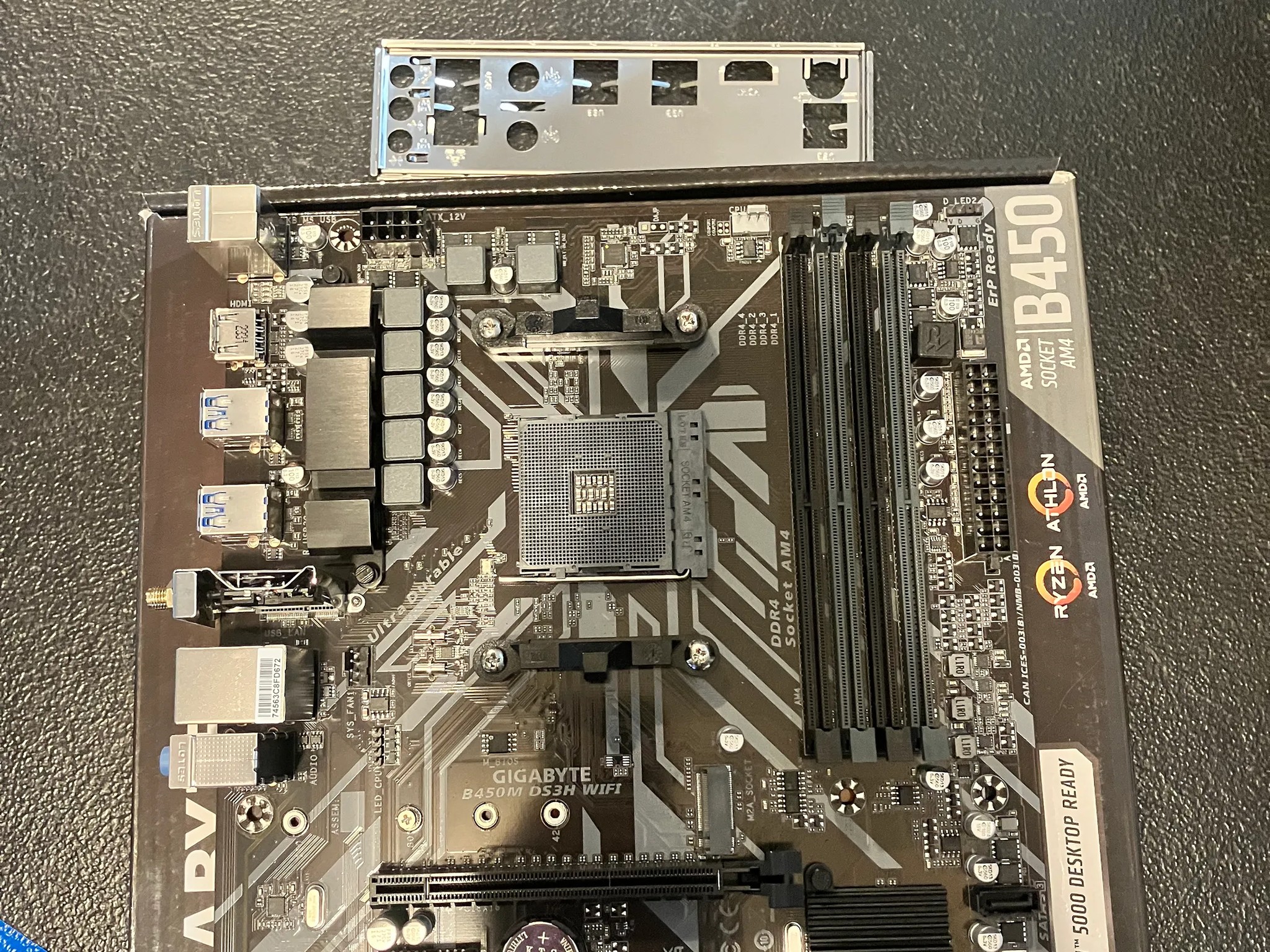 Open Box: Gigabyte B450M DS3H Wi-Fi Micro ATX AM4 DDR4 Motherboard W/ IO shield.