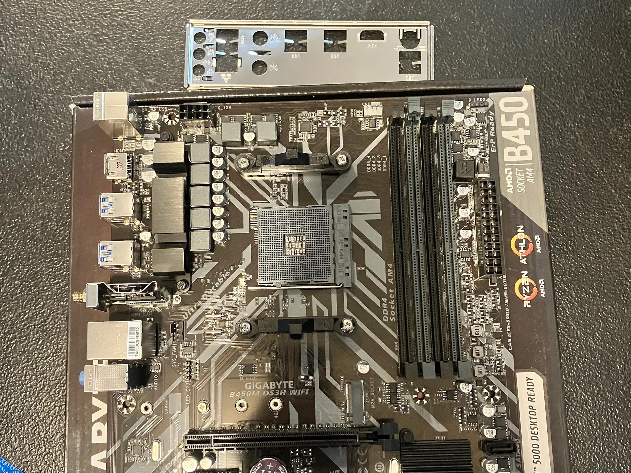 Open Box: Gigabyte B450M DS3H Wi-Fi Micro ATX AM4 DDR4 Motherboard W/ IO shield.