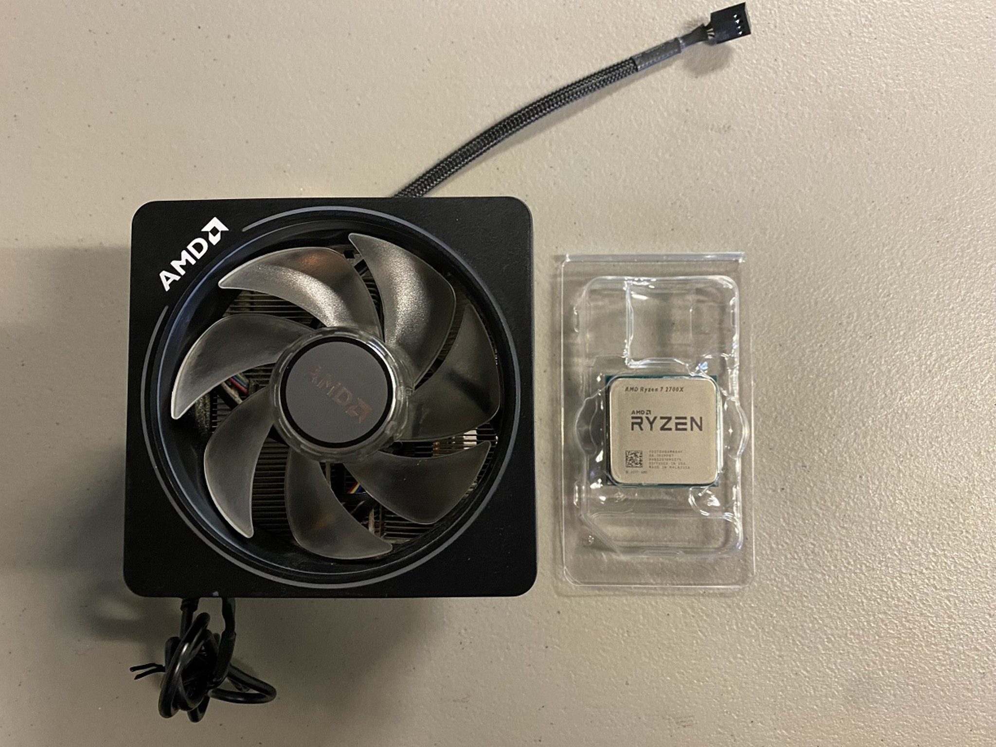 AMD Ryzen 7 2700x with Wraith Prism RGB cooler.