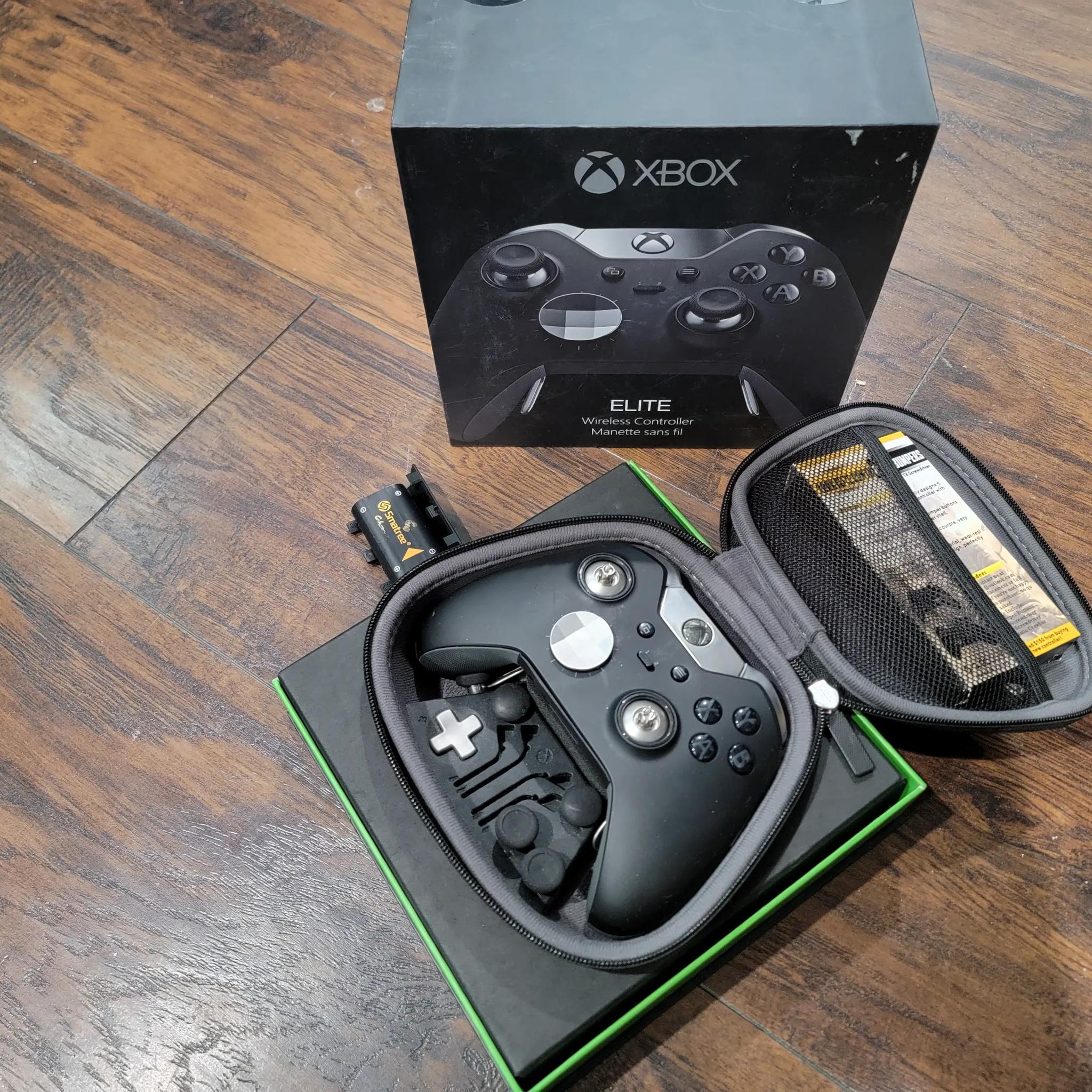Xbox one with elite series 1 controller and 8 games