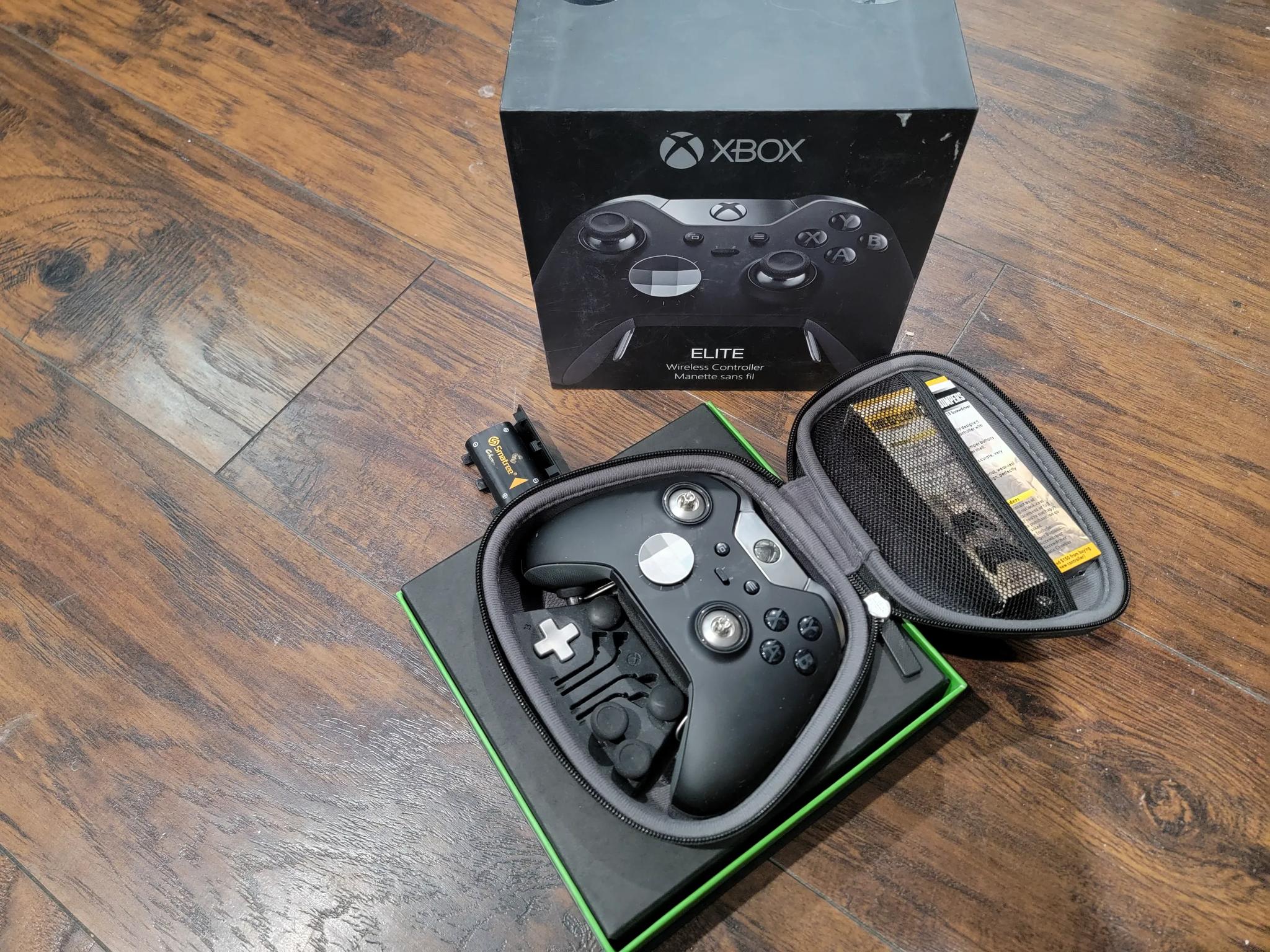 Xbox one with elite series 1 controller and 8 games