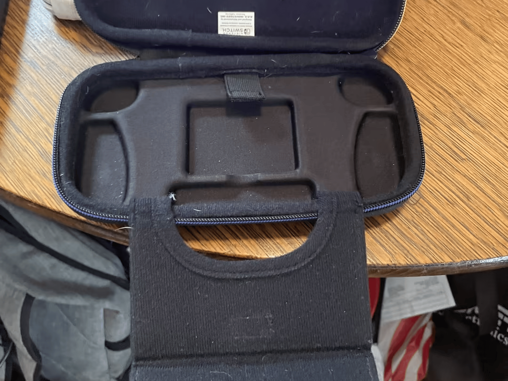 Gray Nintendo Switch Lite + case