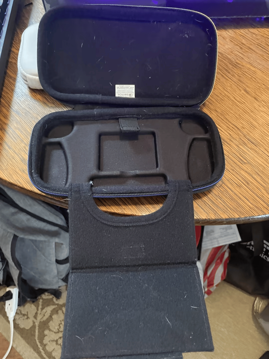 Gray Nintendo Switch Lite + case