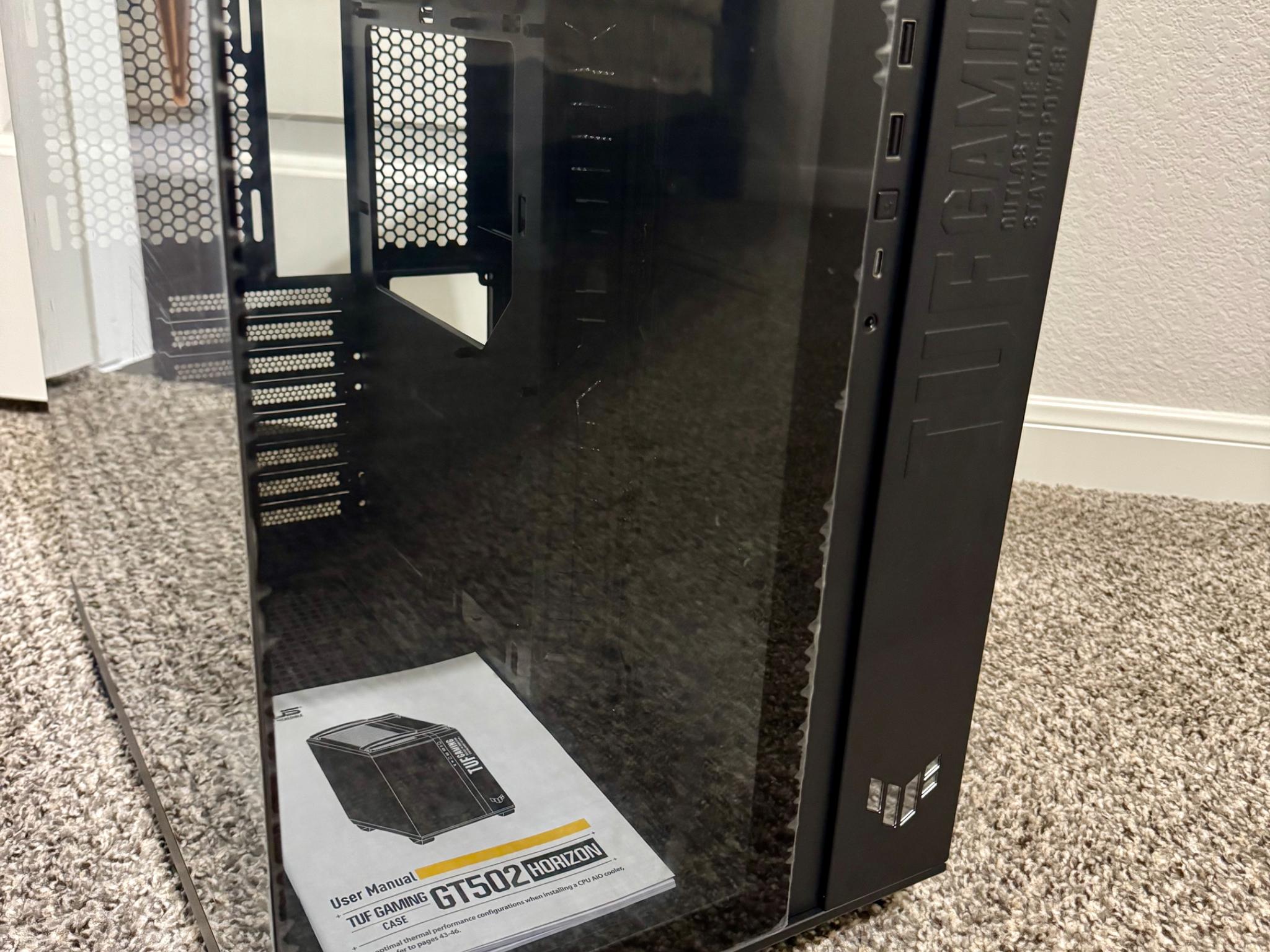 Black - Asus TUF Gaming GT502 in retail packaging.