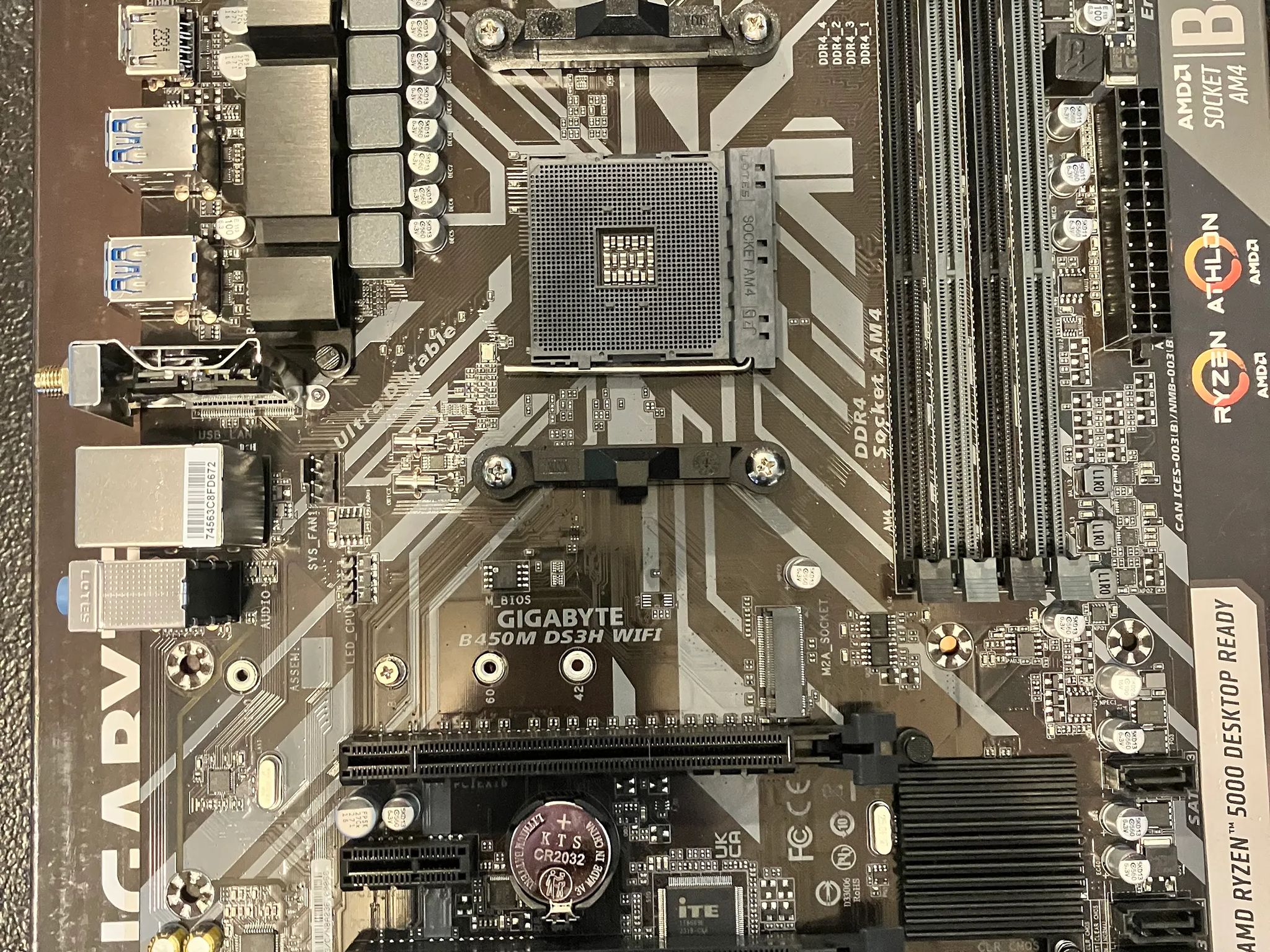 Open Box: Gigabyte B450M DS3H Wi-Fi Micro ATX AM4 DDR4 Motherboard W/ IO shield.