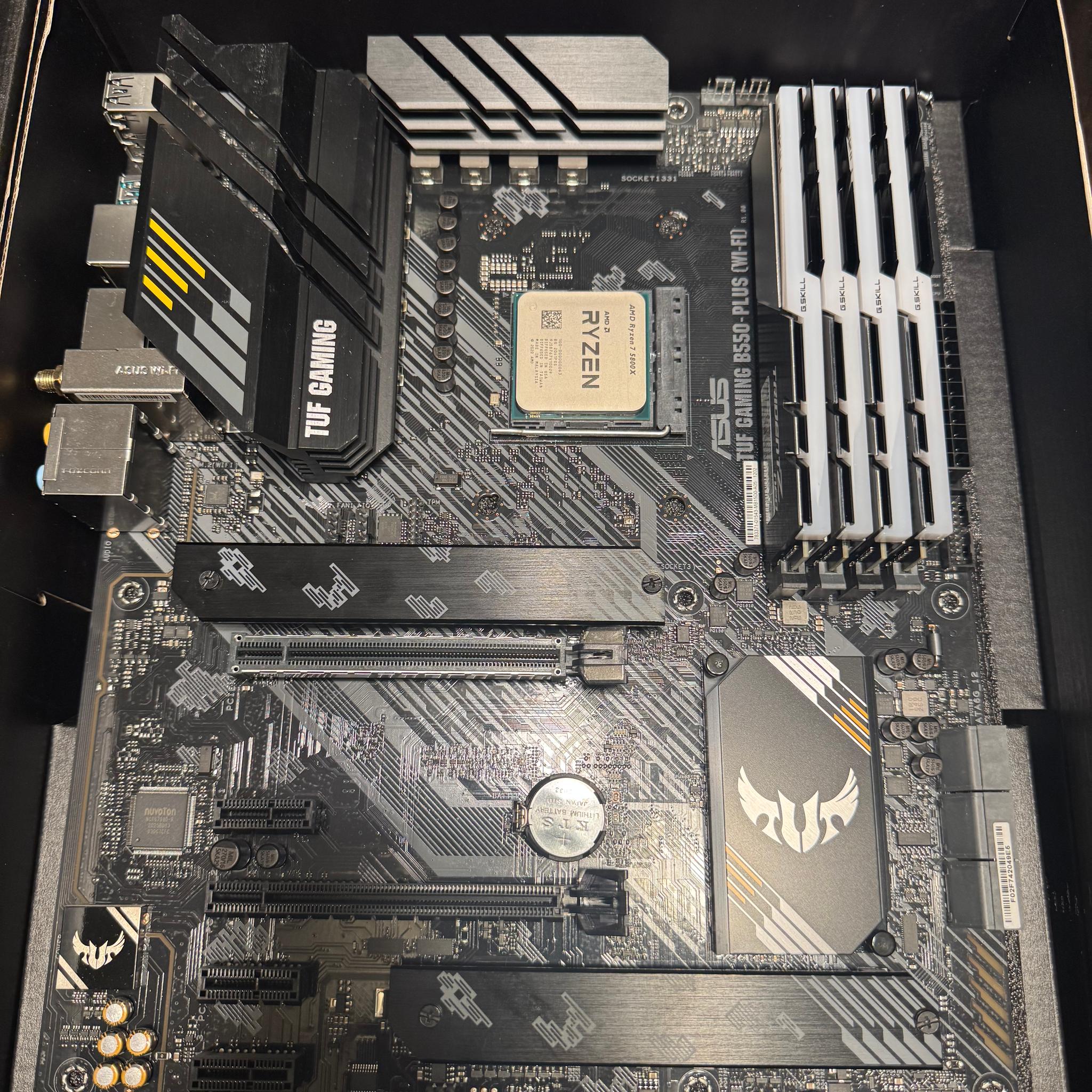 ASUS TUF B550 PLUS (WiFi) Gently used. Pictures show processor and ram on motherboard.(Not Included)